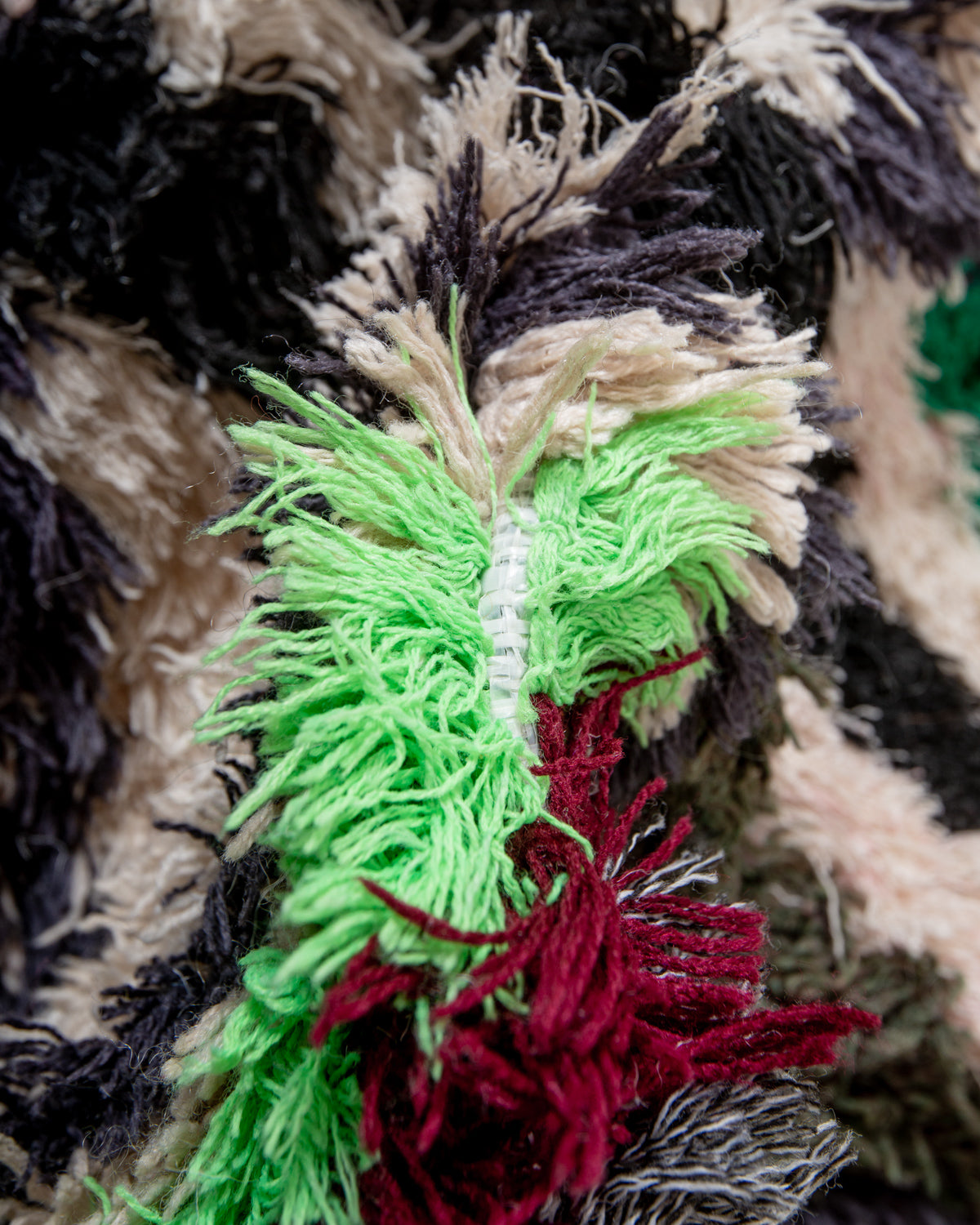 Modern designer vintage handcrafted Berber rug from Morocco. Boucherouite runner rug with beautiful colors and patterns.