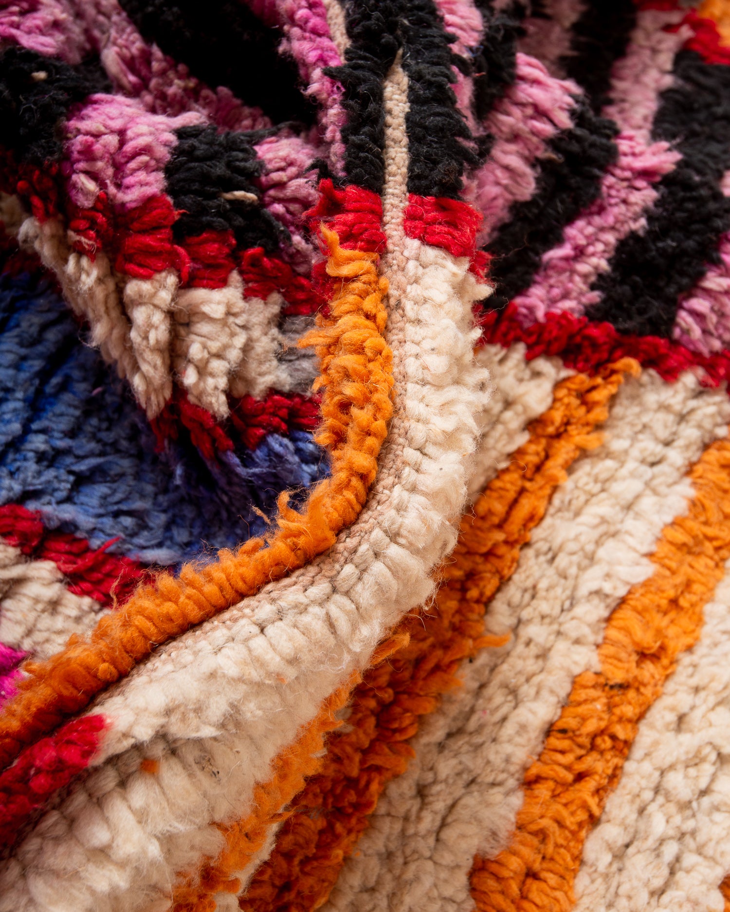 Modern, designer, handcrafted Berber rug from Morocco. Vintage carpet with beautiful colours and patterns and fluffy texture.