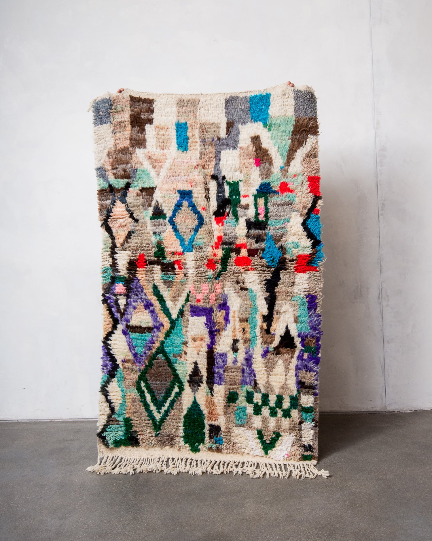 Modern, designer, handcrafted Berber rug from Morocco. Vintage carpet with beautiful colours and patterns and fluffy texture.