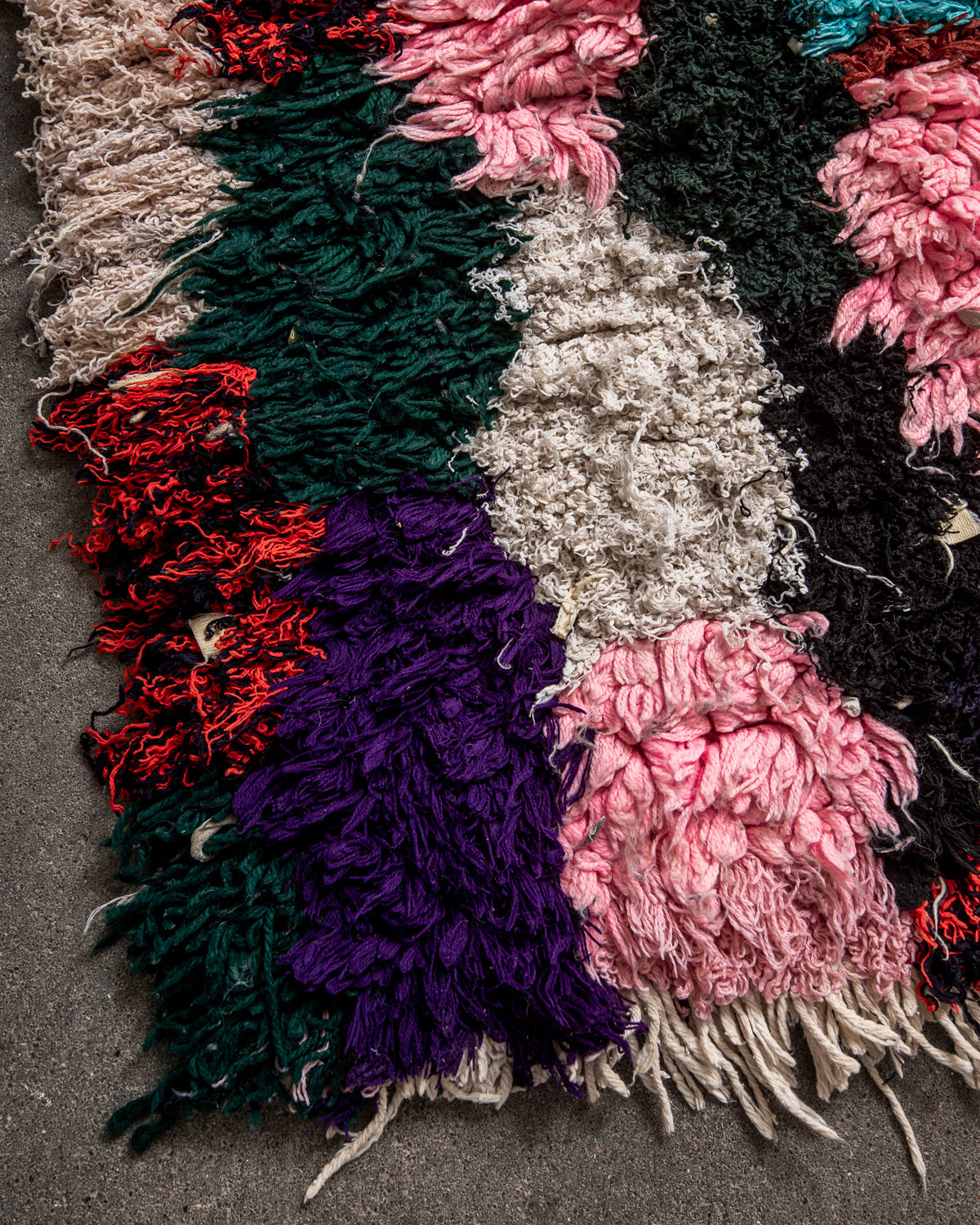 Modern designer vintage handcrafted Berber rug from Morocco. Boucherouite runner rug with beautiful colors and patterns.