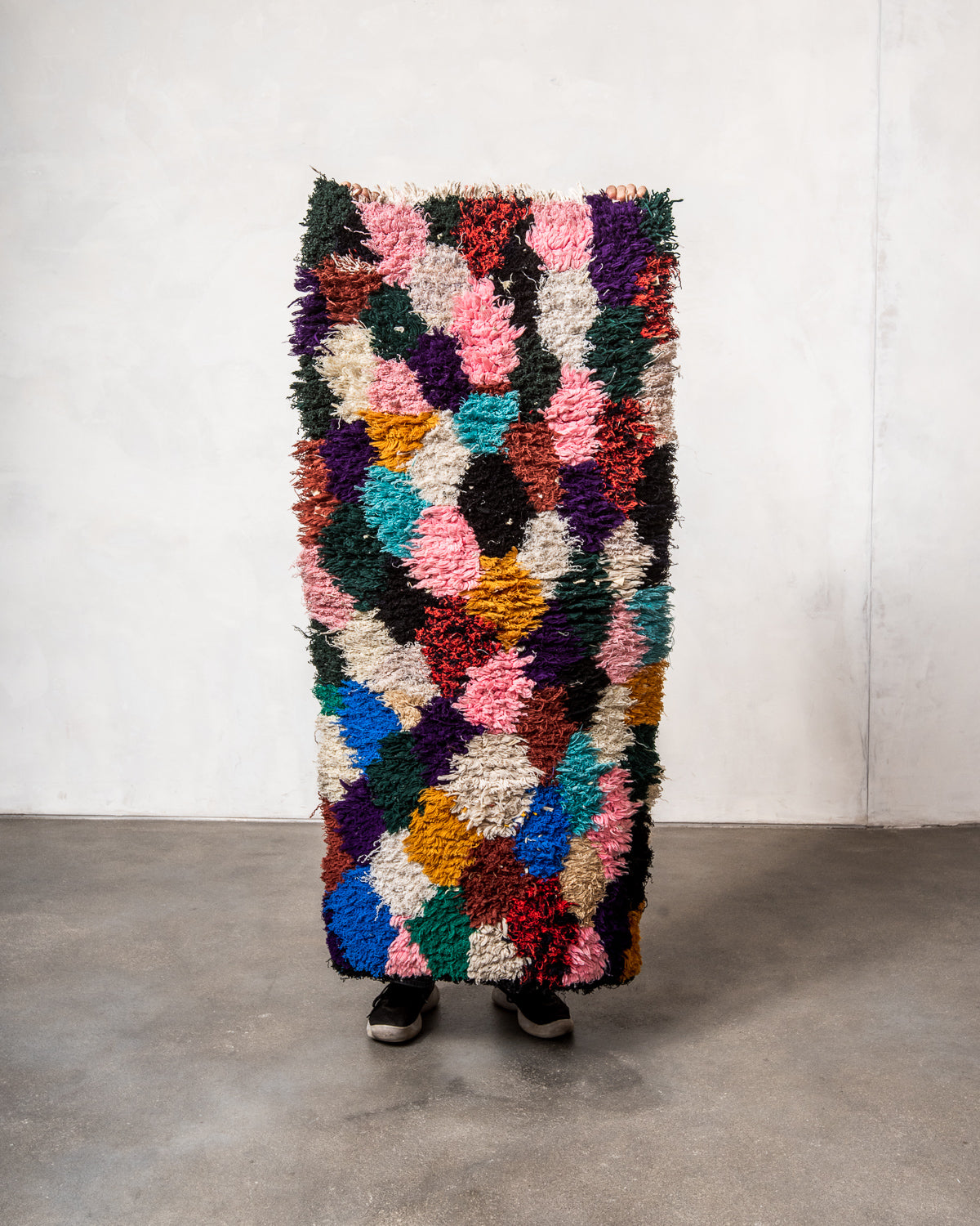 Modern designer vintage handcrafted Berber rug from Morocco. Boucherouite runner rug with beautiful colors and patterns.