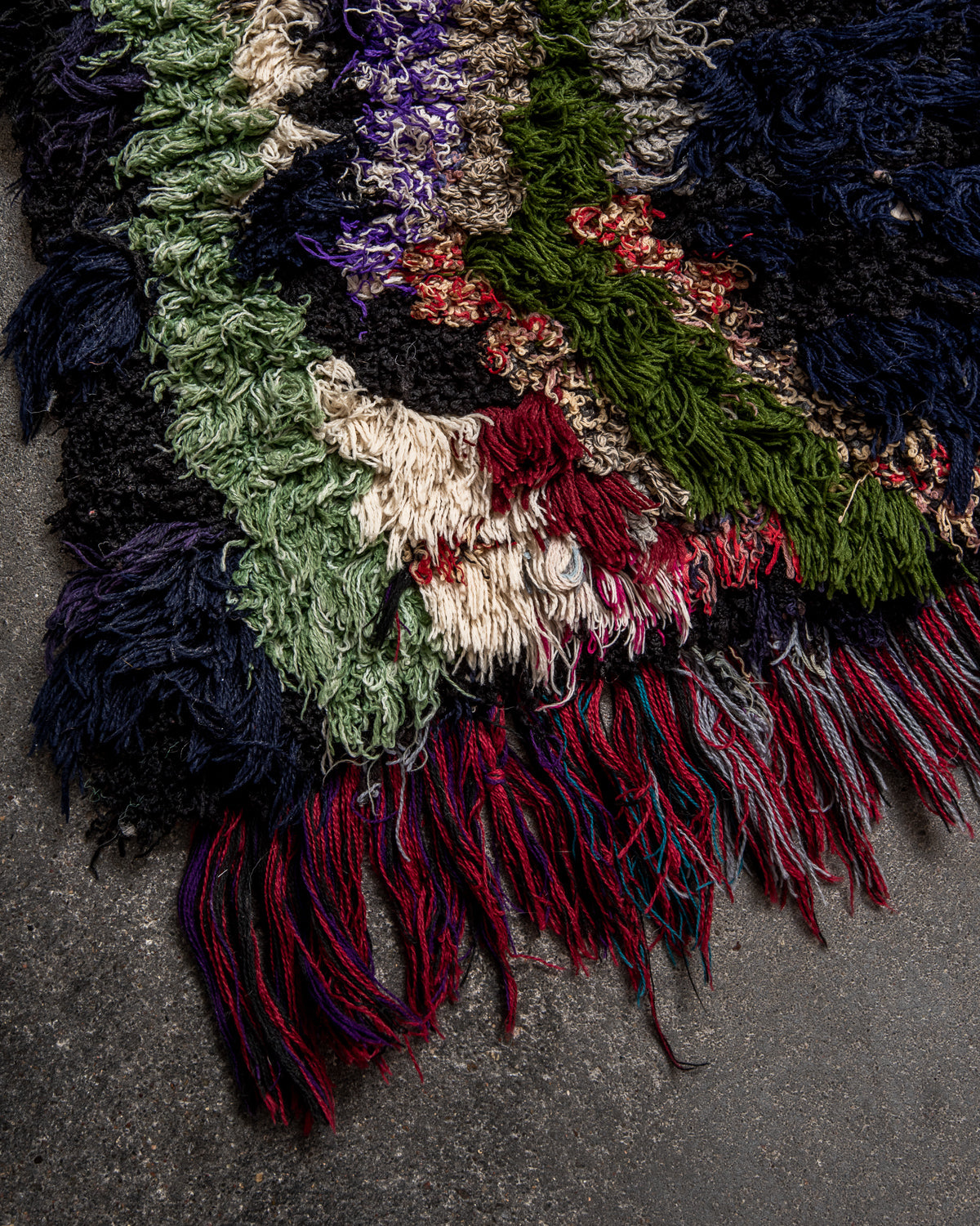 Modern designer vintage handcrafted Berber rug from Morocco. Boucherouite runner rug with beautiful colors and patterns.