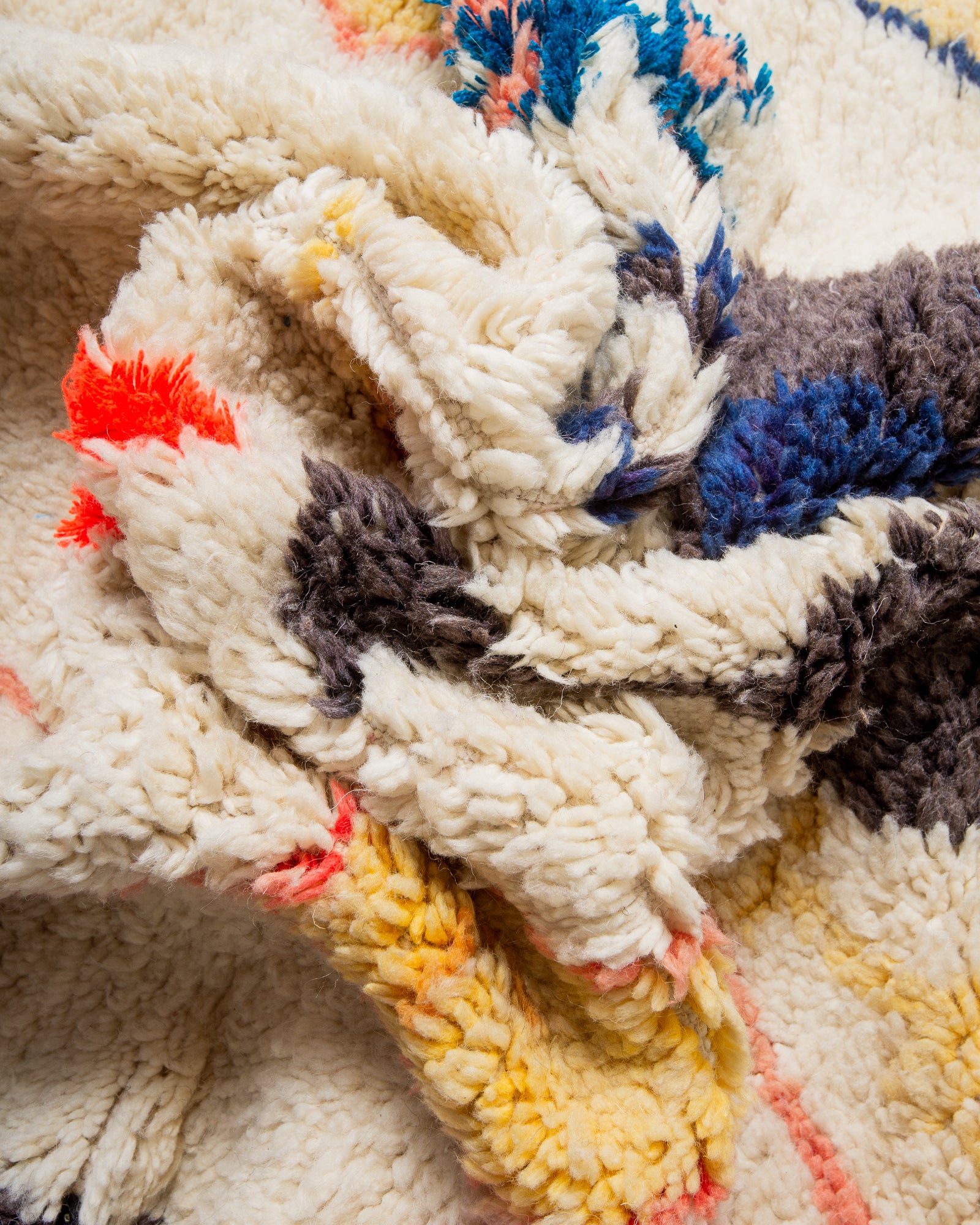 Modern, designer, handcrafted Berber rug from Morocco. Vintage carpet with beautiful colours and patterns and fluffy texture.