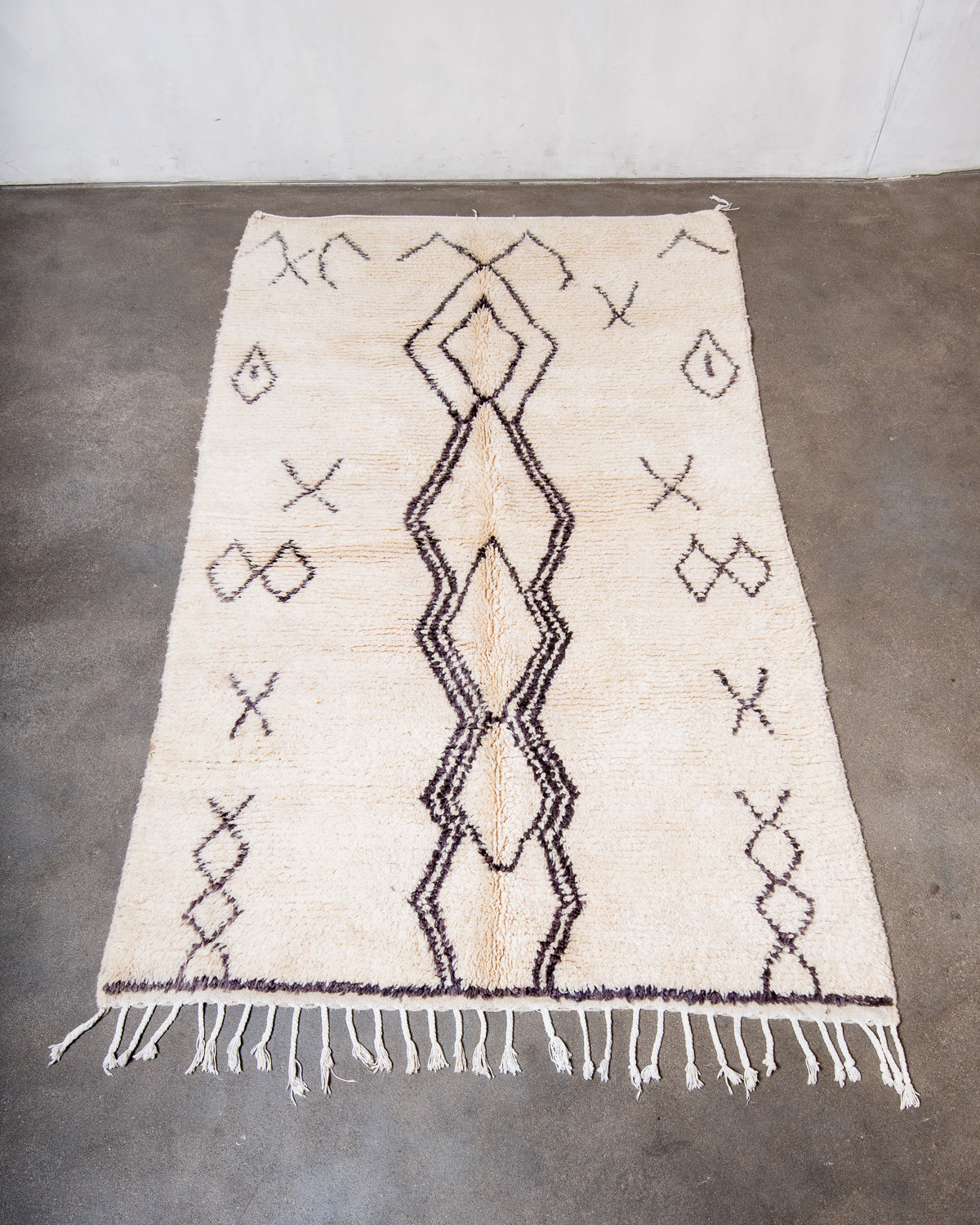 Modern, designer, handcrafted Berber rug from Morocco. Vintage carpet with beautiful colours and patterns and fluffy texture.