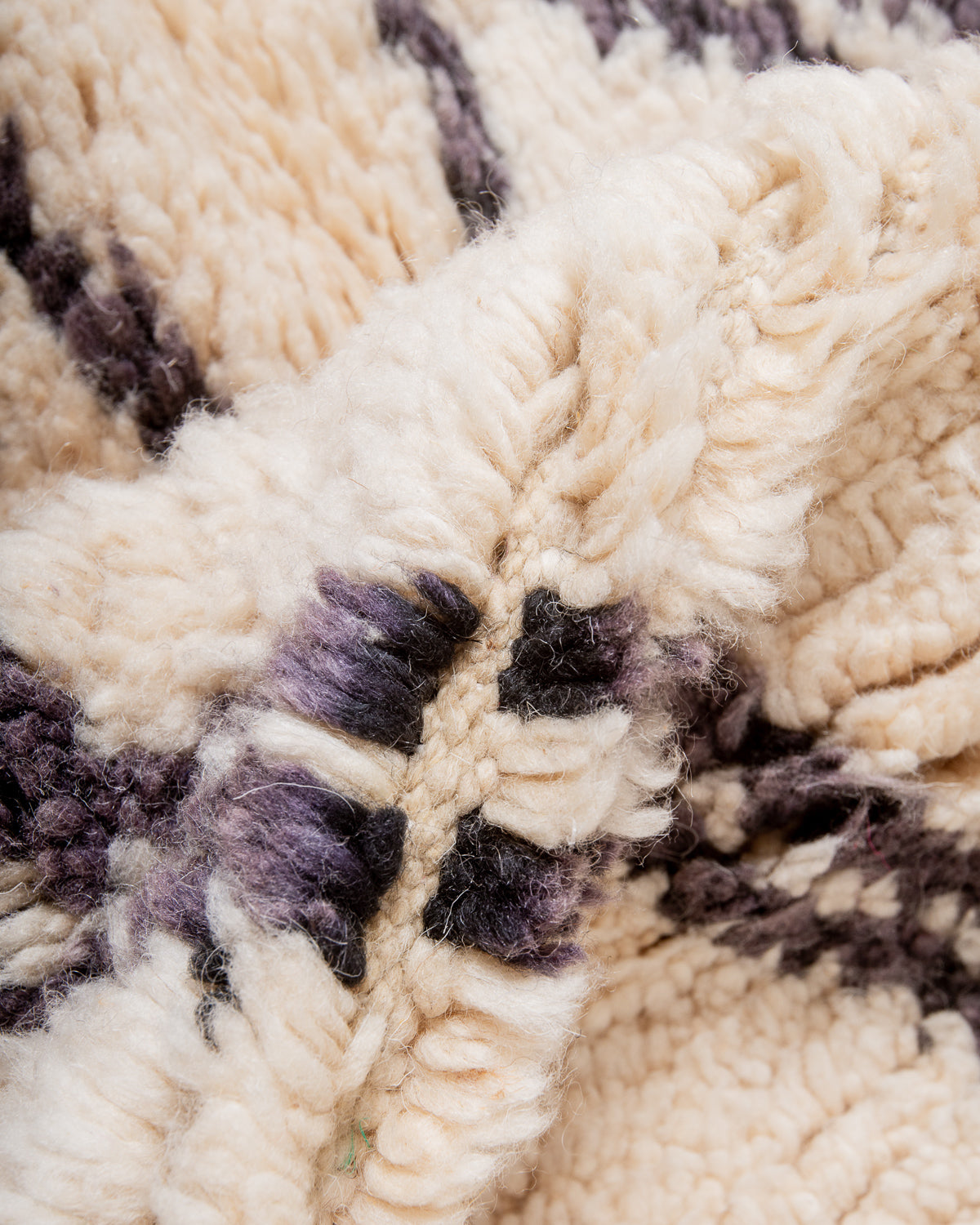 Modern, designer, handcrafted Berber rug from Morocco. Vintage carpet with beautiful colours and patterns and fluffy texture.