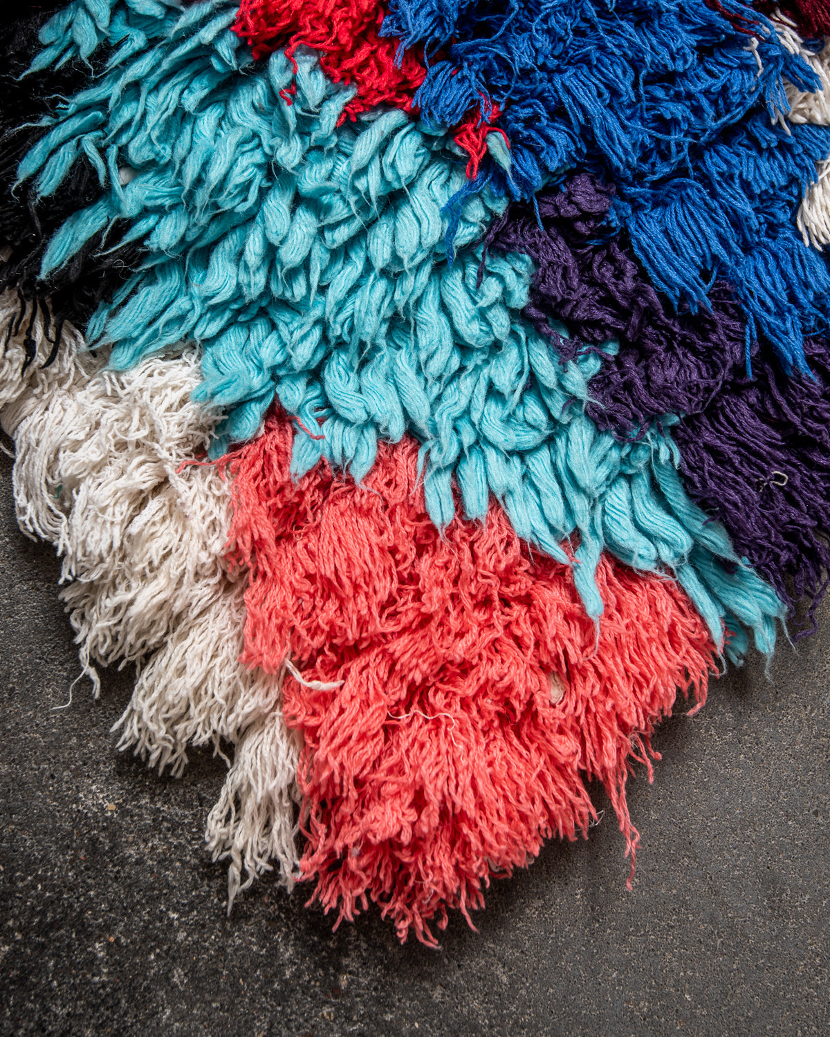 Modern designer vintage handcrafted Berber rug from Morocco. Boucherouite runner rug with beautiful colors and patterns.