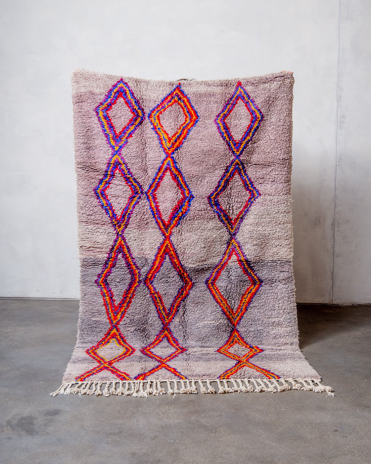 Modern, designer, handcrafted Berber rug from Morocco. Vintage carpet with beautiful colours and patterns and fluffy texture.