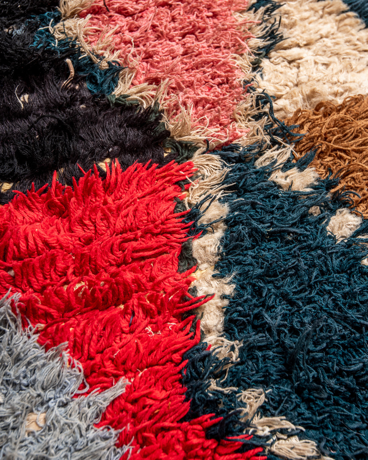Modern designer vintage handcrafted Berber rug from Morocco. Boucherouite runner rug with beautiful colors and patterns.