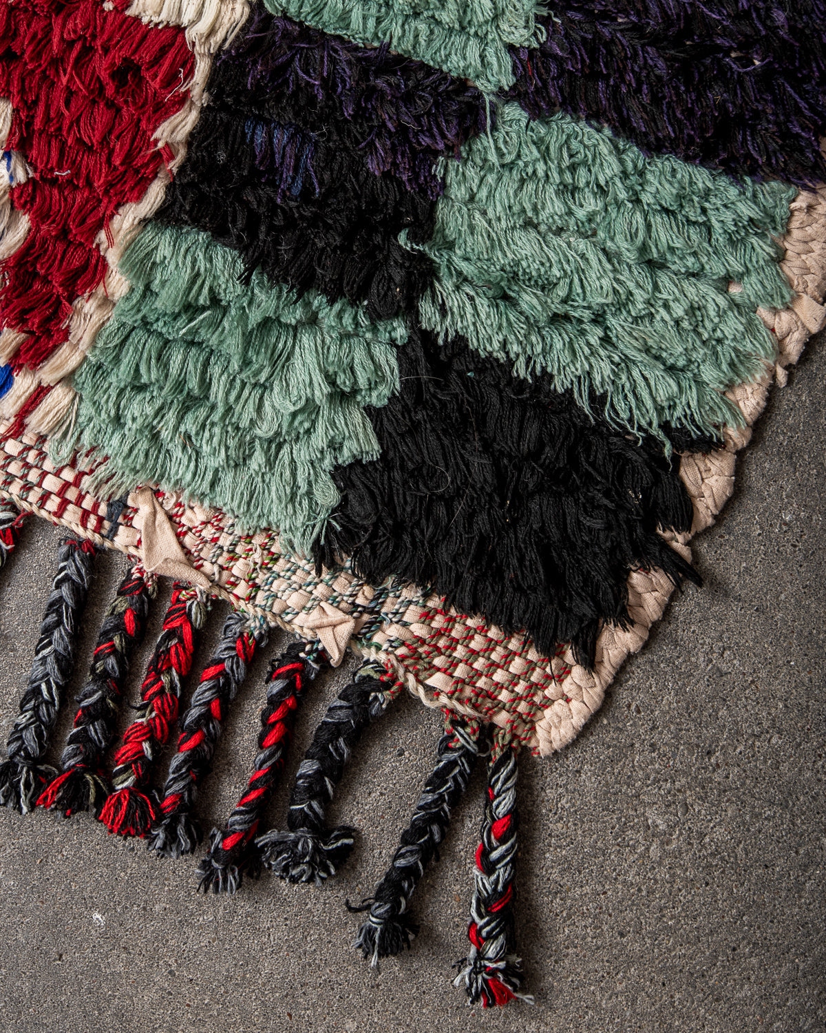 Modern designer vintage handcrafted Berber rug from Morocco. Boucherouite runner rug with beautiful colors and patterns.