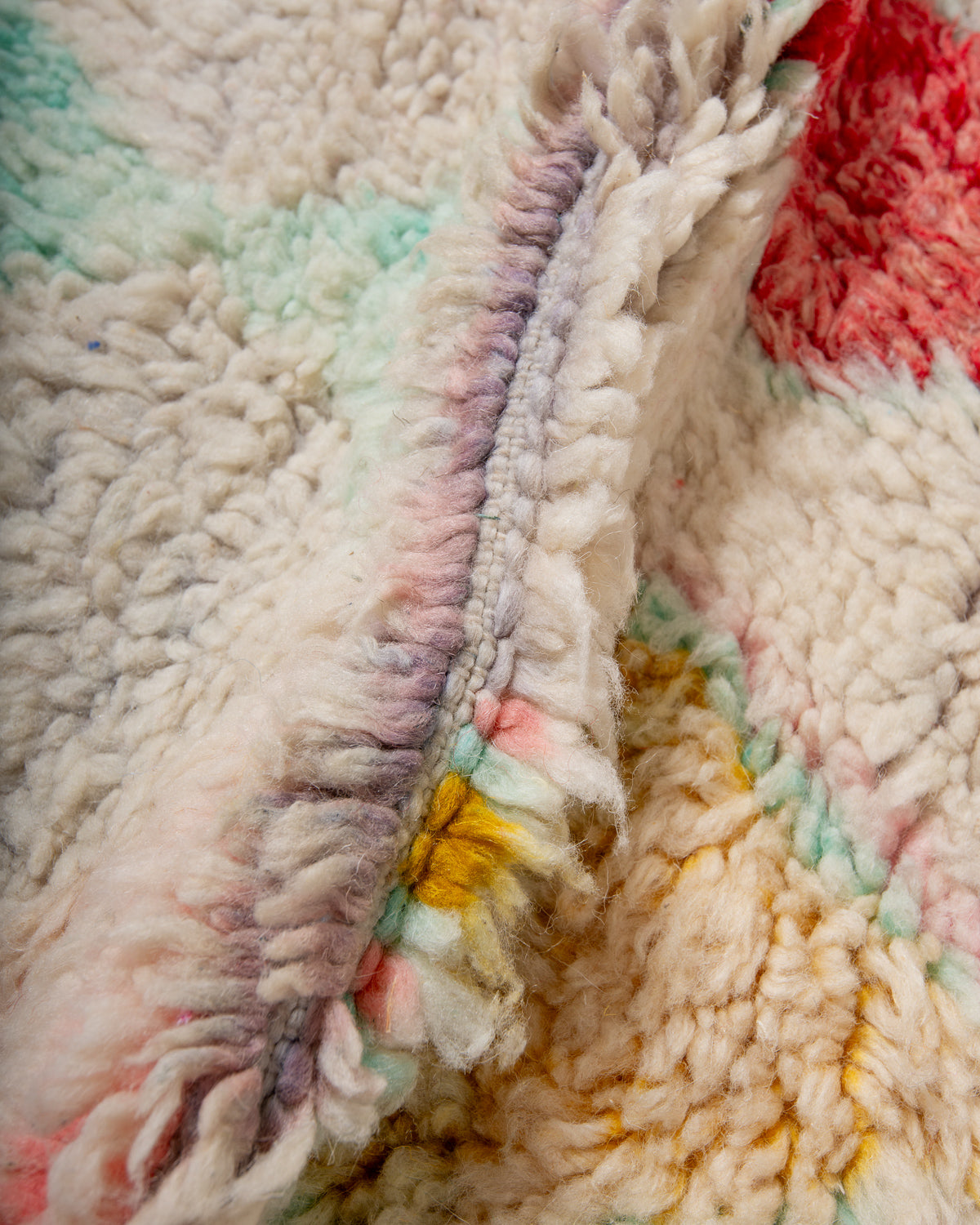 Modern, designer, handcrafted Berber rug from Morocco. Vintage carpet with beautiful colours and patterns and fluffy texture.