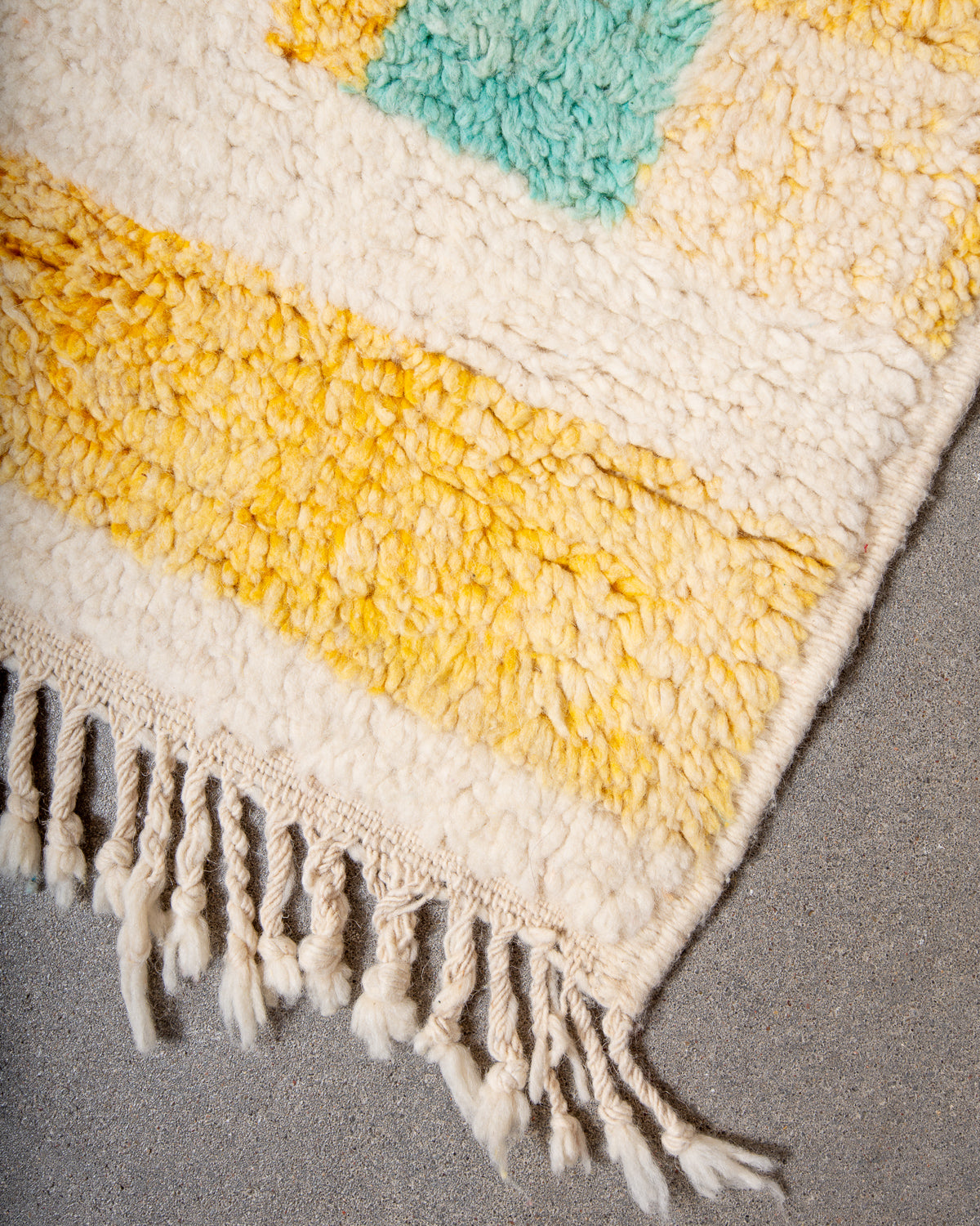 Modern, designer, handcrafted Berber rug from Morocco. Vintage carpet with beautiful colours and patterns and fluffy texture.