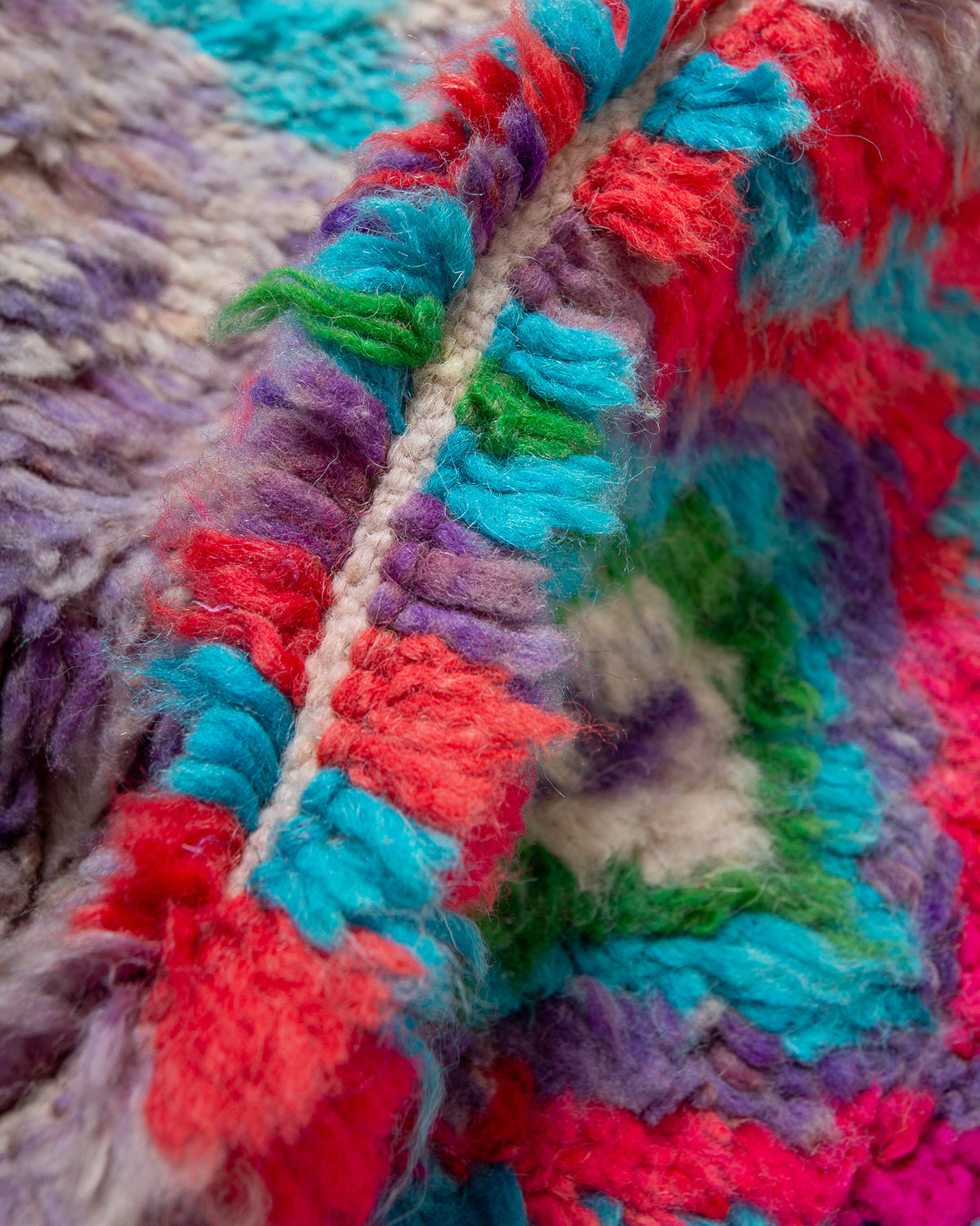 Modern, designer, handcrafted Berber rug from Morocco. Vintage carpet with beautiful colours and patterns and fluffy texture.