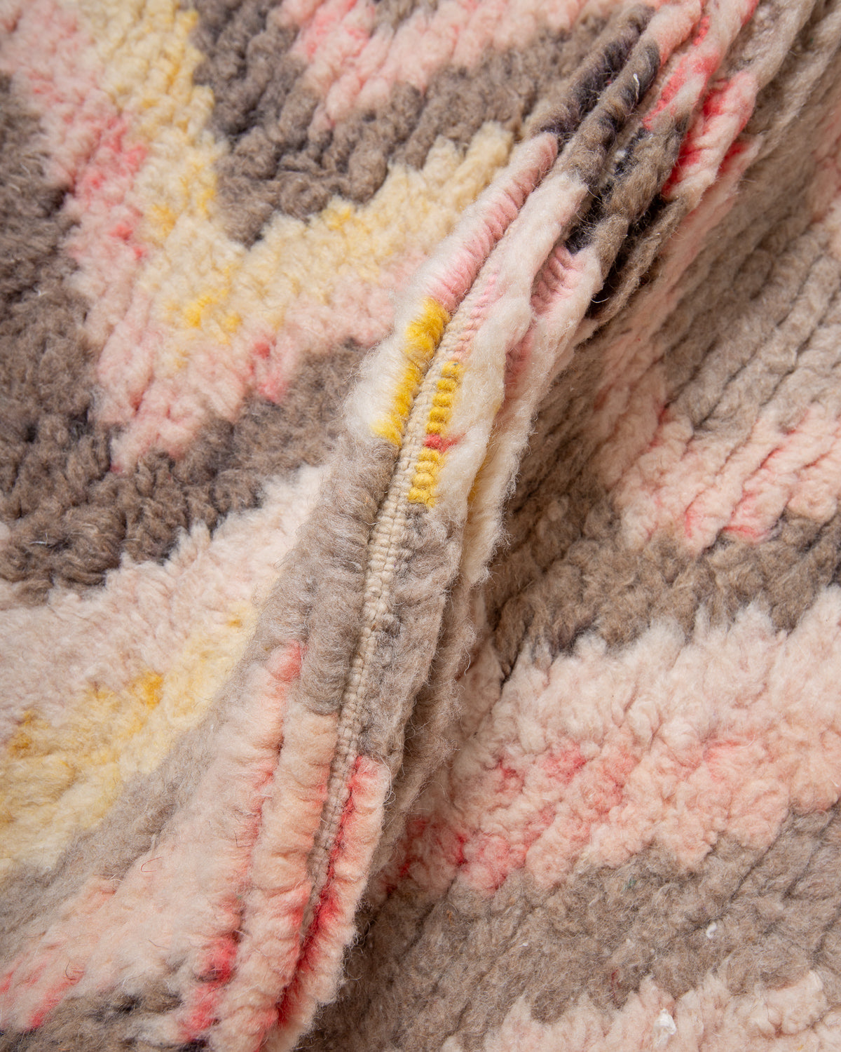 Modern, designer, handcrafted Berber rug from Morocco. Vintage carpet with beautiful colours and patterns and fluffy texture.