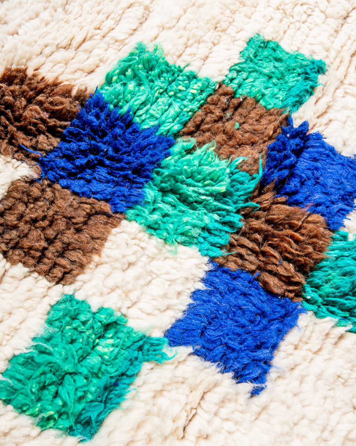 Modern, designer, handcrafted Berber rug from Morocco. Vintage carpet with beautiful colours and patterns and fluffy texture.