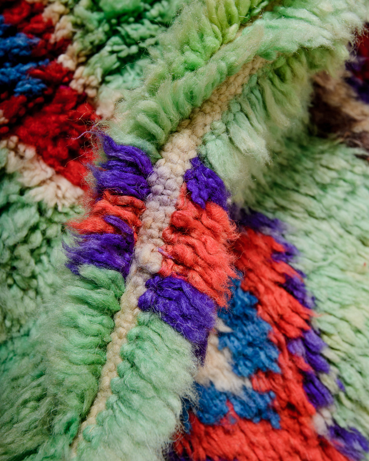 Modern, designer, handcrafted Berber rug from Morocco. Vintage carpet with beautiful colours and patterns and fluffy texture.