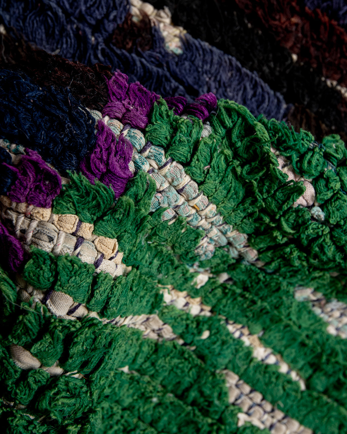 Modern designer vintage handcrafted Berber rug from Morocco. Boucherouite runner rug with beautiful colors and patterns.