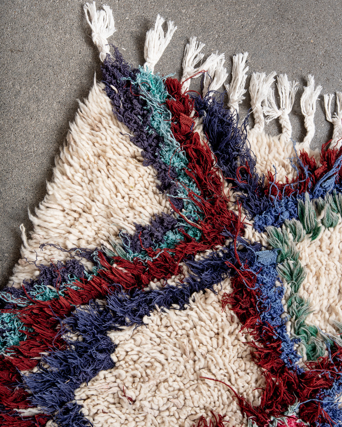 Modern designer vintage handcrafted Berber rug from Morocco. Boucherouite runner rug with beautiful colors and patterns.