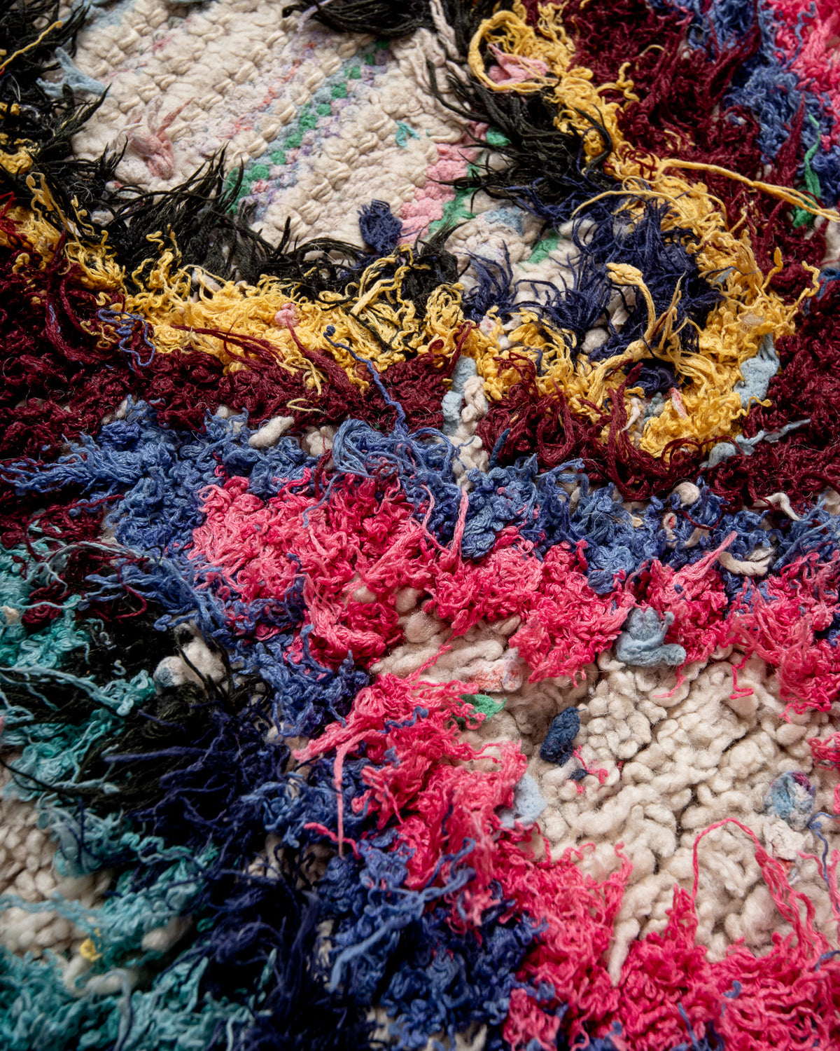 Modern designer vintage handcrafted Berber rug from Morocco. Boucherouite runner rug with beautiful colors and patterns.