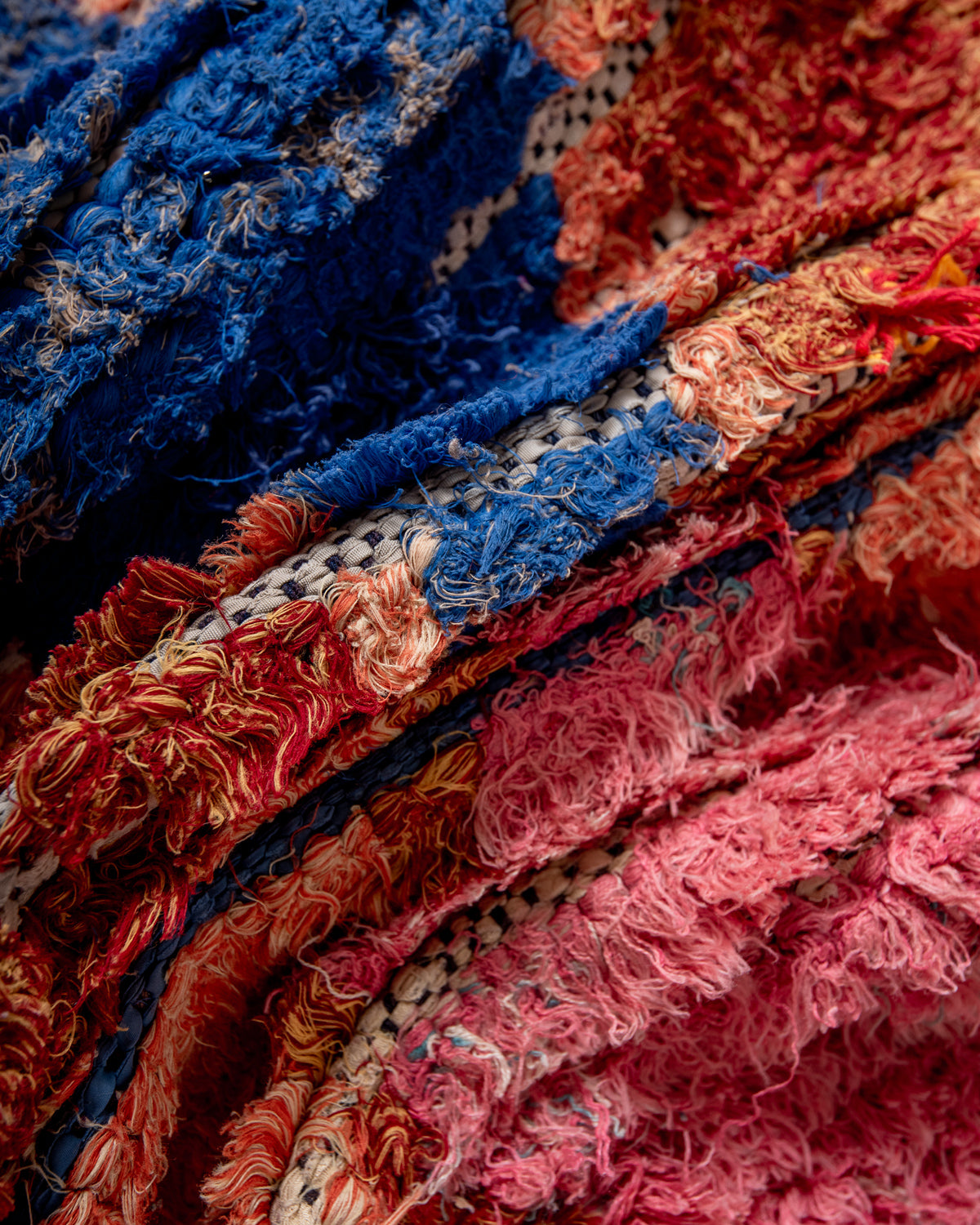 Modern designer vintage handcrafted Berber rug from Morocco. Boucherouite runner rug with beautiful colors and patterns.