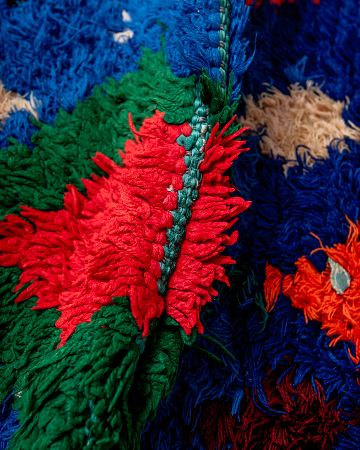 Modern designer vintage handcrafted Berber rug from Morocco. Boucherouite runner rug with beautiful colors and patterns.