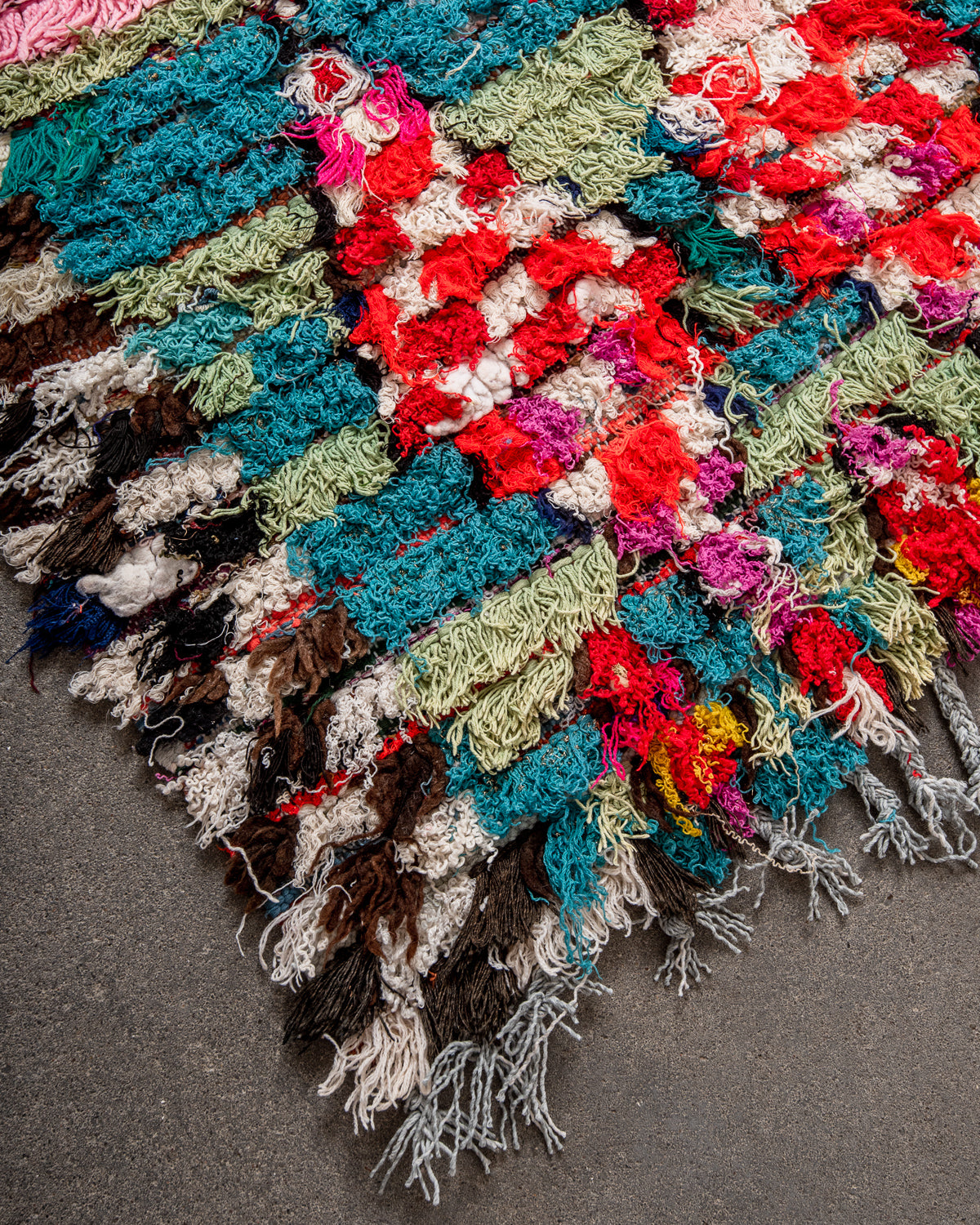 Modern designer vintage handcrafted Berber rug from Morocco. Boucherouite runner rug with beautiful colors and patterns.