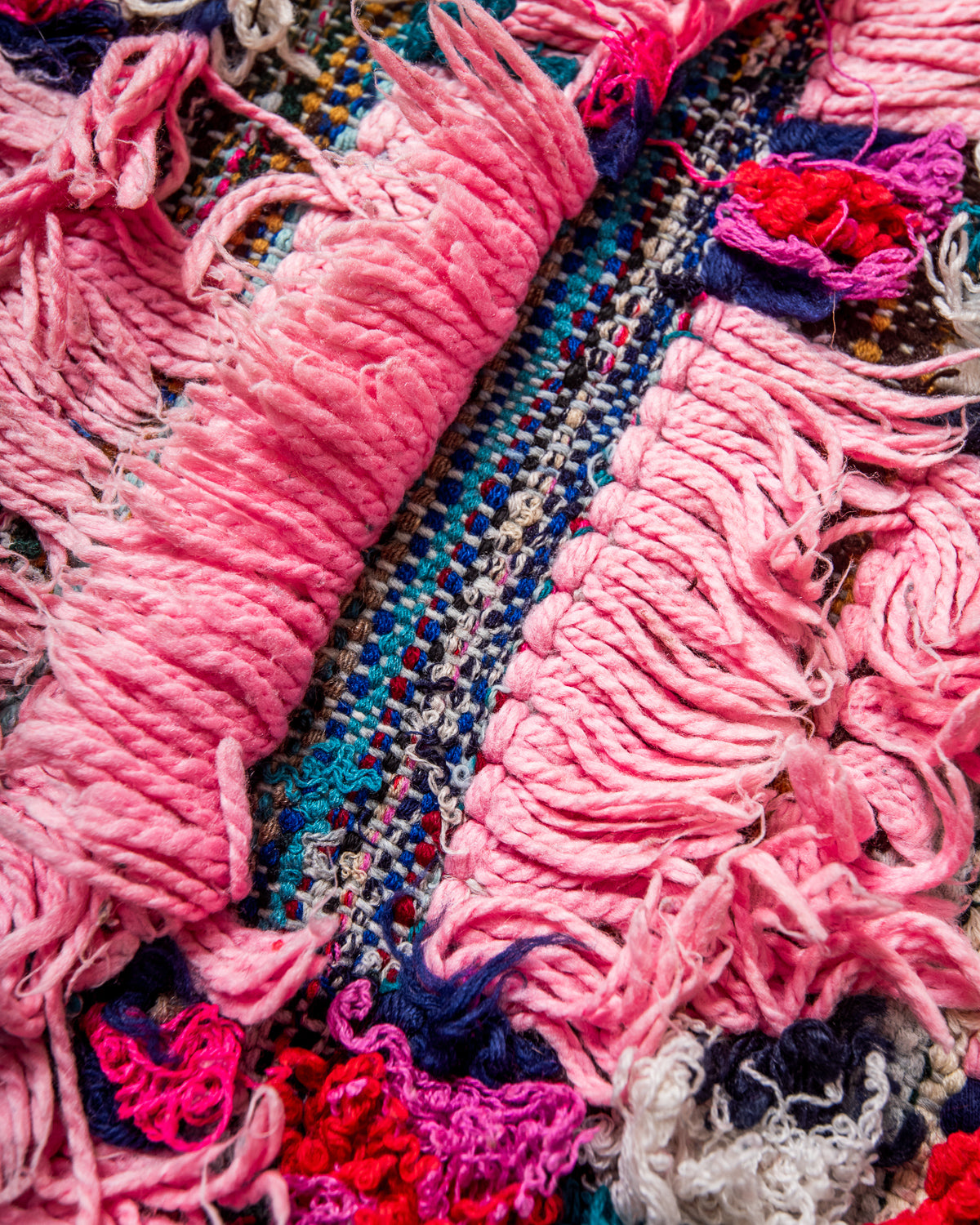 Modern designer vintage handcrafted Berber rug from Morocco. Boucherouite runner rug with beautiful colors and patterns.