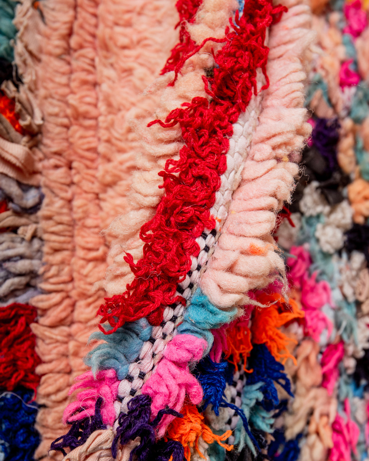 Modern designer vintage handcrafted Berber rug from Morocco. Boucherouite runner rug with beautiful colors and patterns.