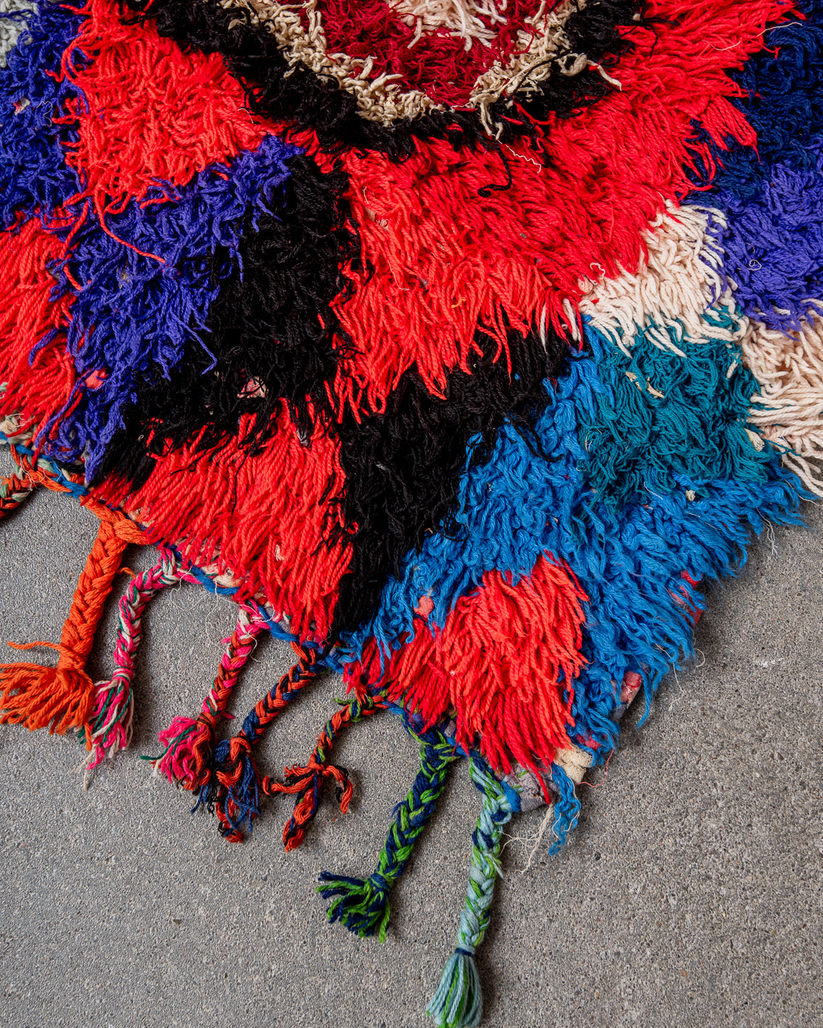 Modern designer vintage handcrafted Berber rug from Morocco. Boucherouite runner rug with beautiful colors and patterns.