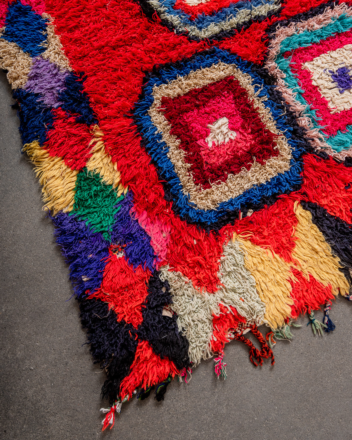 Modern designer vintage handcrafted Berber rug from Morocco. Boucherouite runner rug with beautiful colors and patterns.