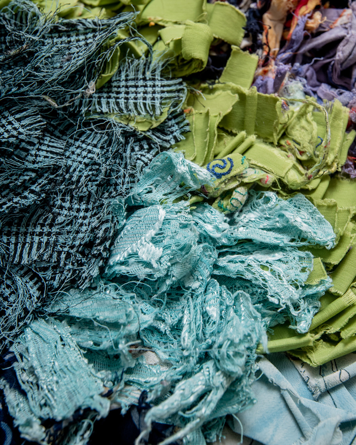 Modern designer vintage handcrafted Berber rug from Morocco. Boucherouite runner rug with beautiful colors and patterns.