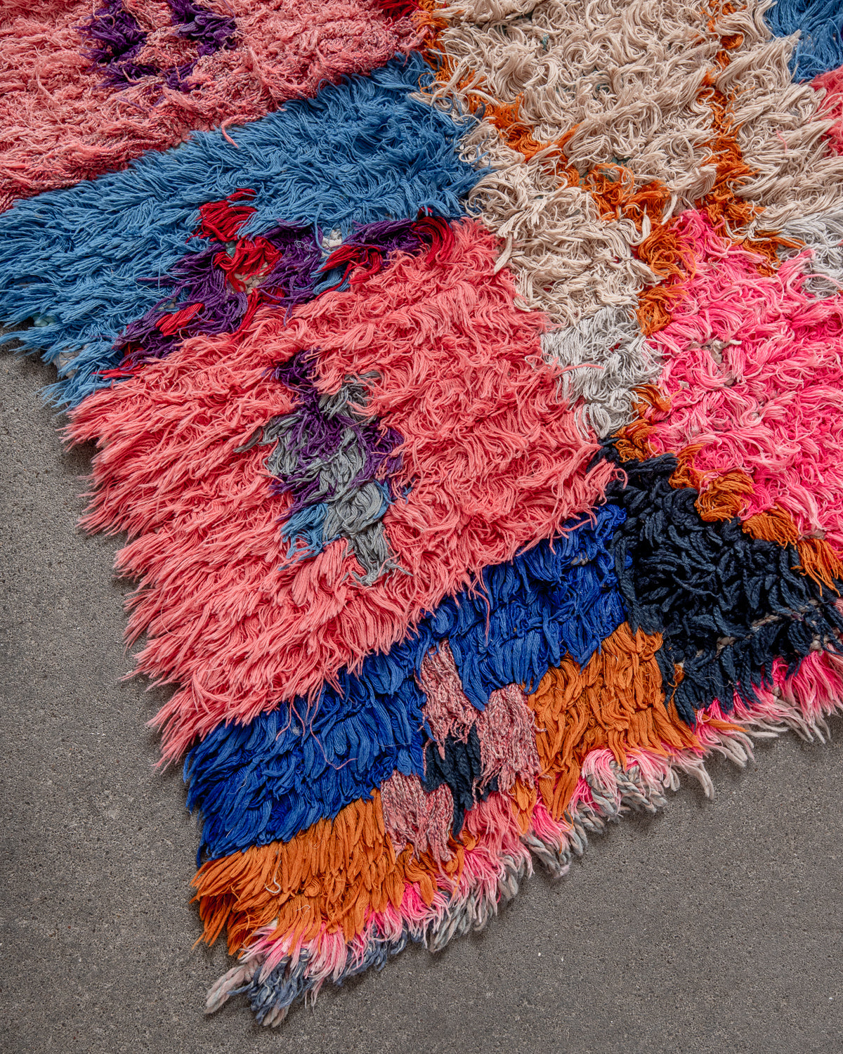 Modern designer vintage handcrafted Berber rug from Morocco. Boucherouite runner rug with beautiful colors and patterns.