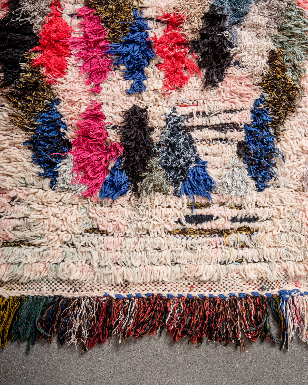 Modern designer vintage handcrafted Berber rug from Morocco. Boucherouite runner rug with beautiful colors and patterns.