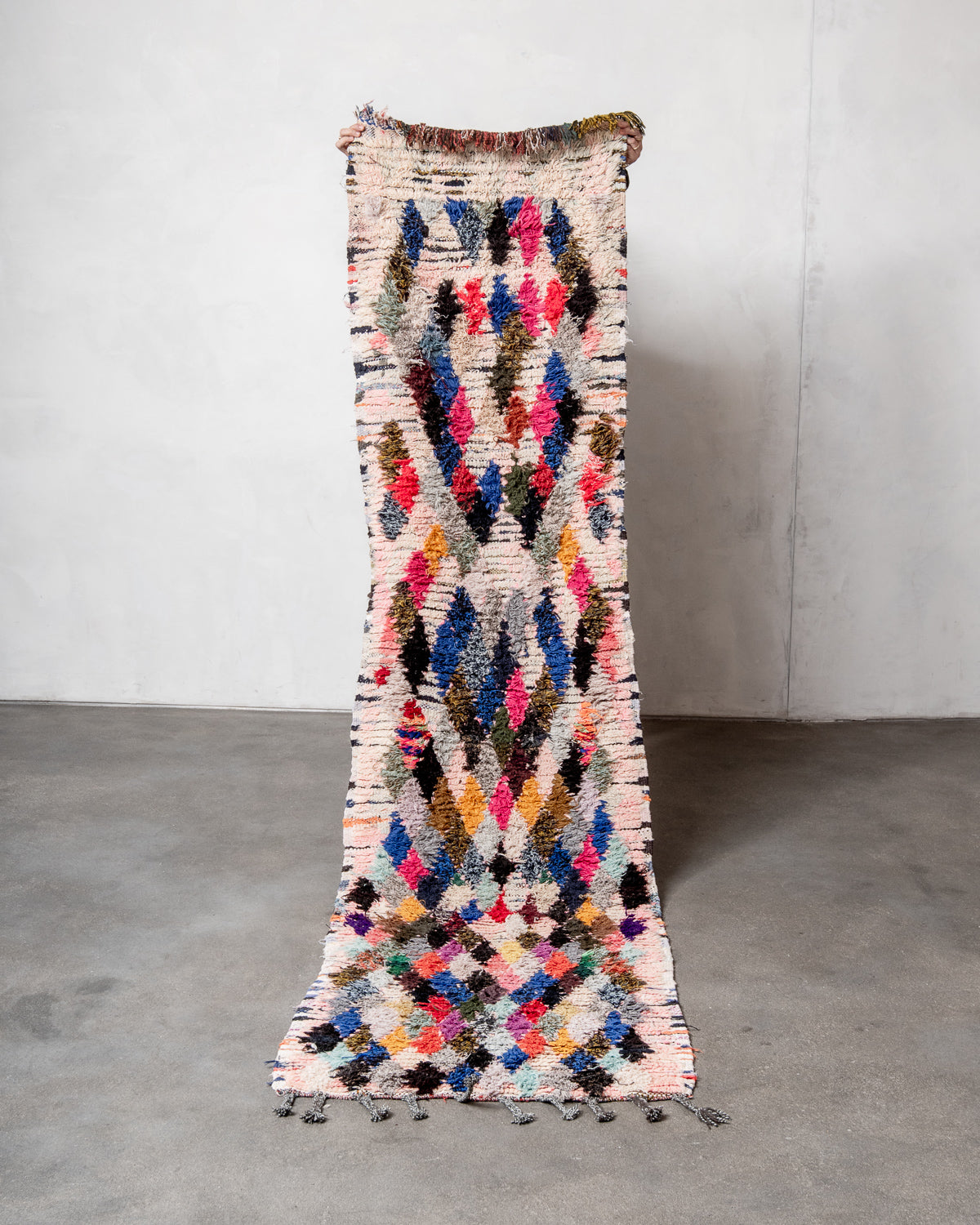 Modern designer vintage handcrafted Berber rug from Morocco. Boucherouite runner rug with beautiful colors and patterns.