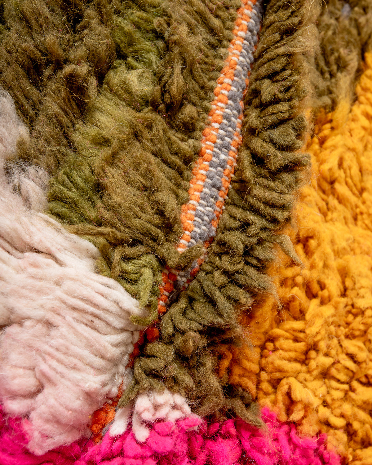 Modern, designer, handcrafted Berber rug from Morocco. Vintage carpet with beautiful colours and patterns and fluffy texture.