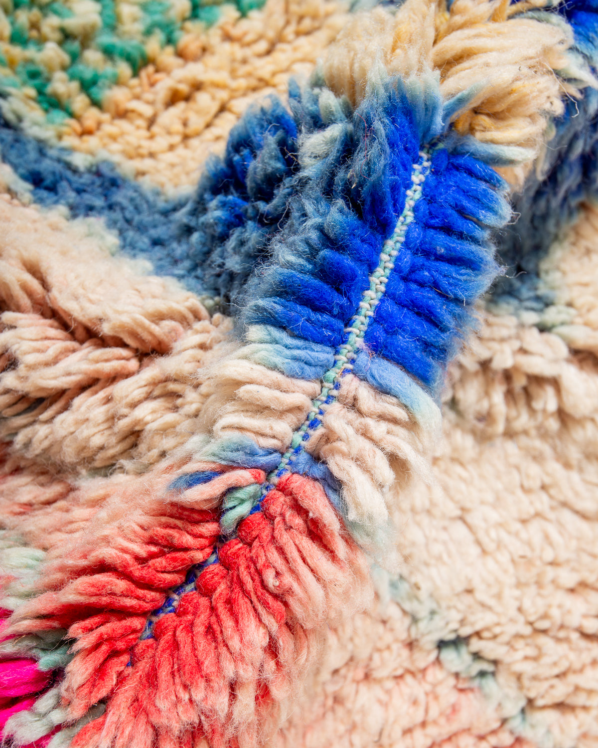 Modern, designer, handcrafted Berber runner rug from Morocco. Beniourain carpet with beautiful colours and patterns and fluffy wool texture.