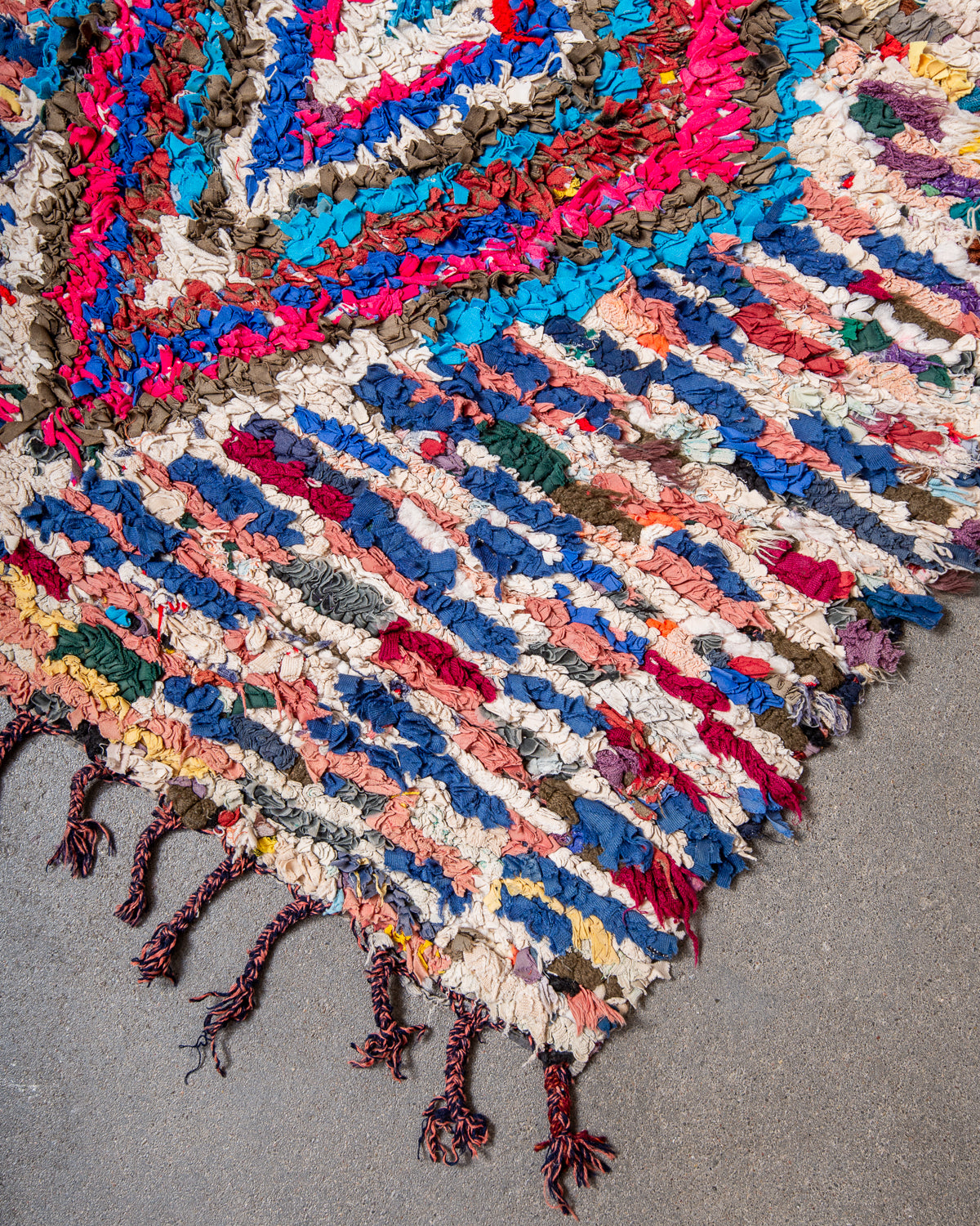 Modern designer vintage handcrafted Berber rug from Morocco. Boucherouite runner rug with beautiful colors and patterns.