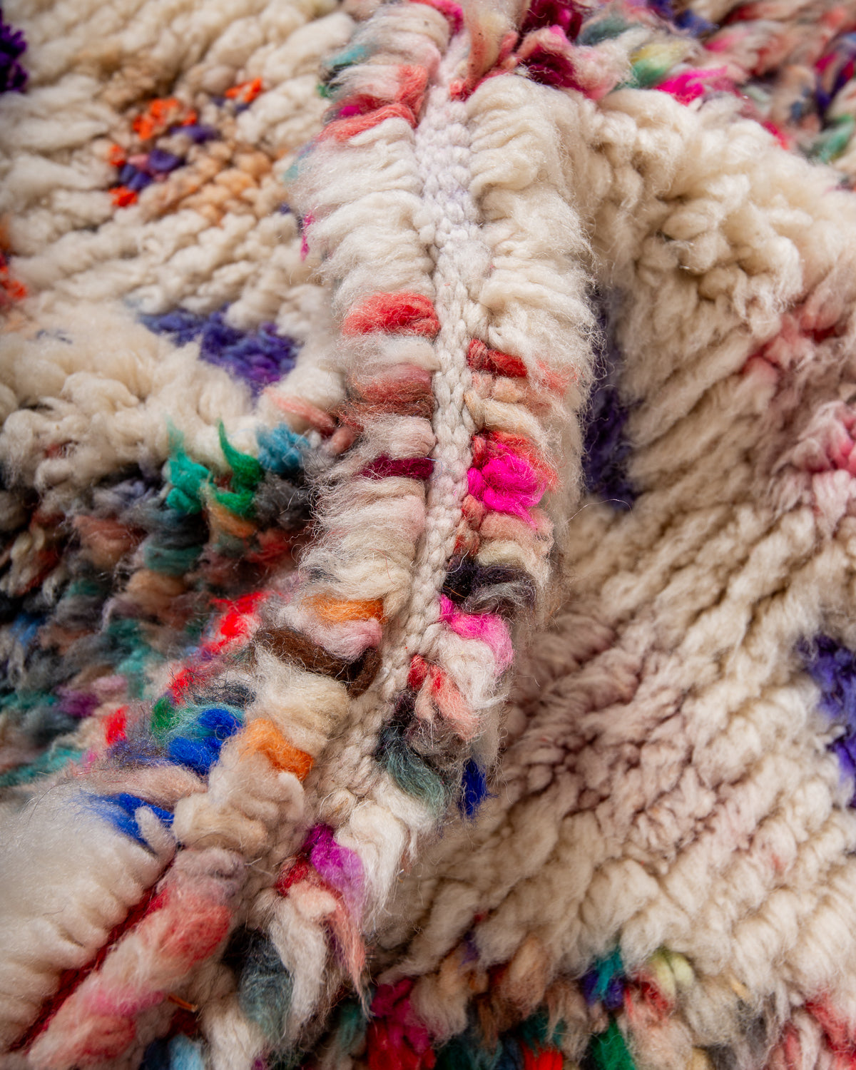 Modern, designer, handcrafted Berber rug from Morocco. Vintage carpet with beautiful colours and patterns and fluffy texture.