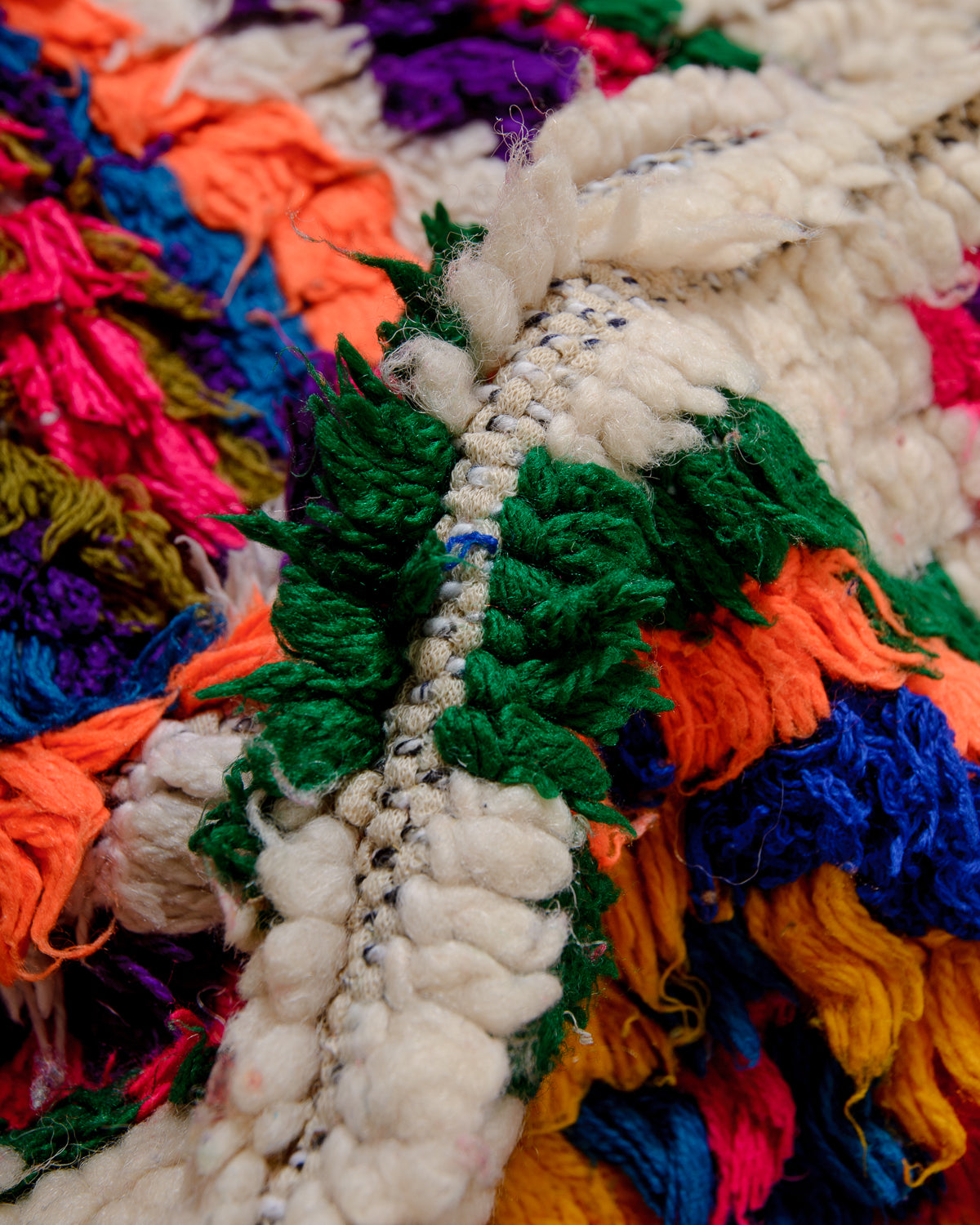 Modern designer vintage handcrafted Berber rug from Morocco. Boucherouite runner rug with beautiful colors and patterns.