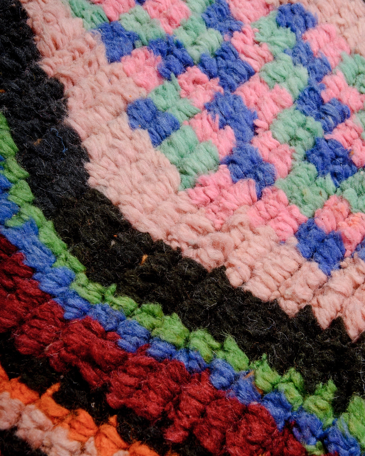 Detail of Berberlin Runner Rug made of brightly coloured wool.