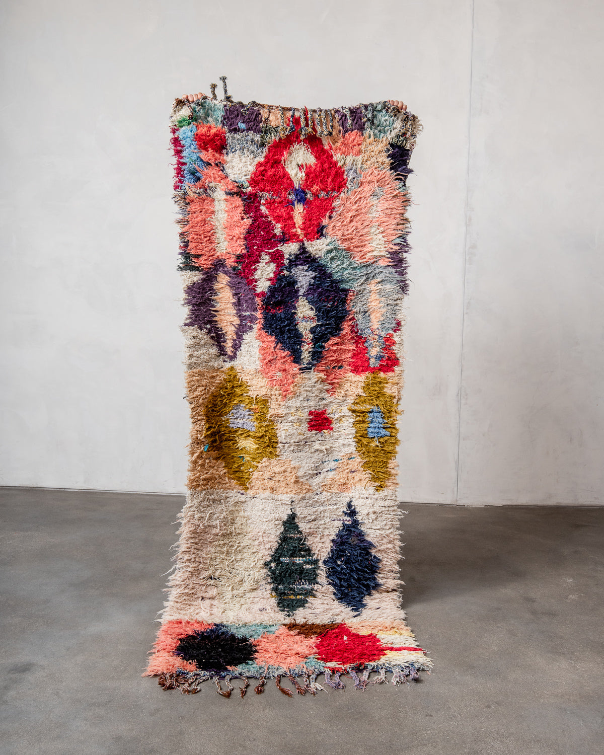 Modern designer vintage handcrafted Berber rug from Morocco. Boucherouite with beautiful colors and patterns.