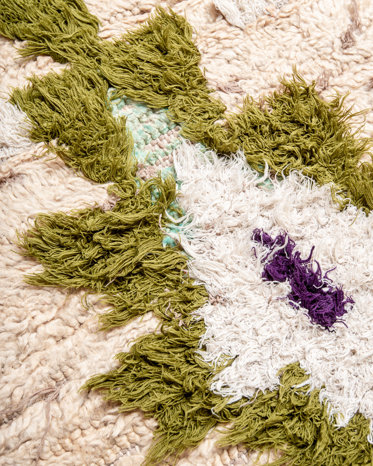 Modern designer vintage handcrafted Berber rug from Morocco. Boucherouite runner rug with beautiful colors and patterns.