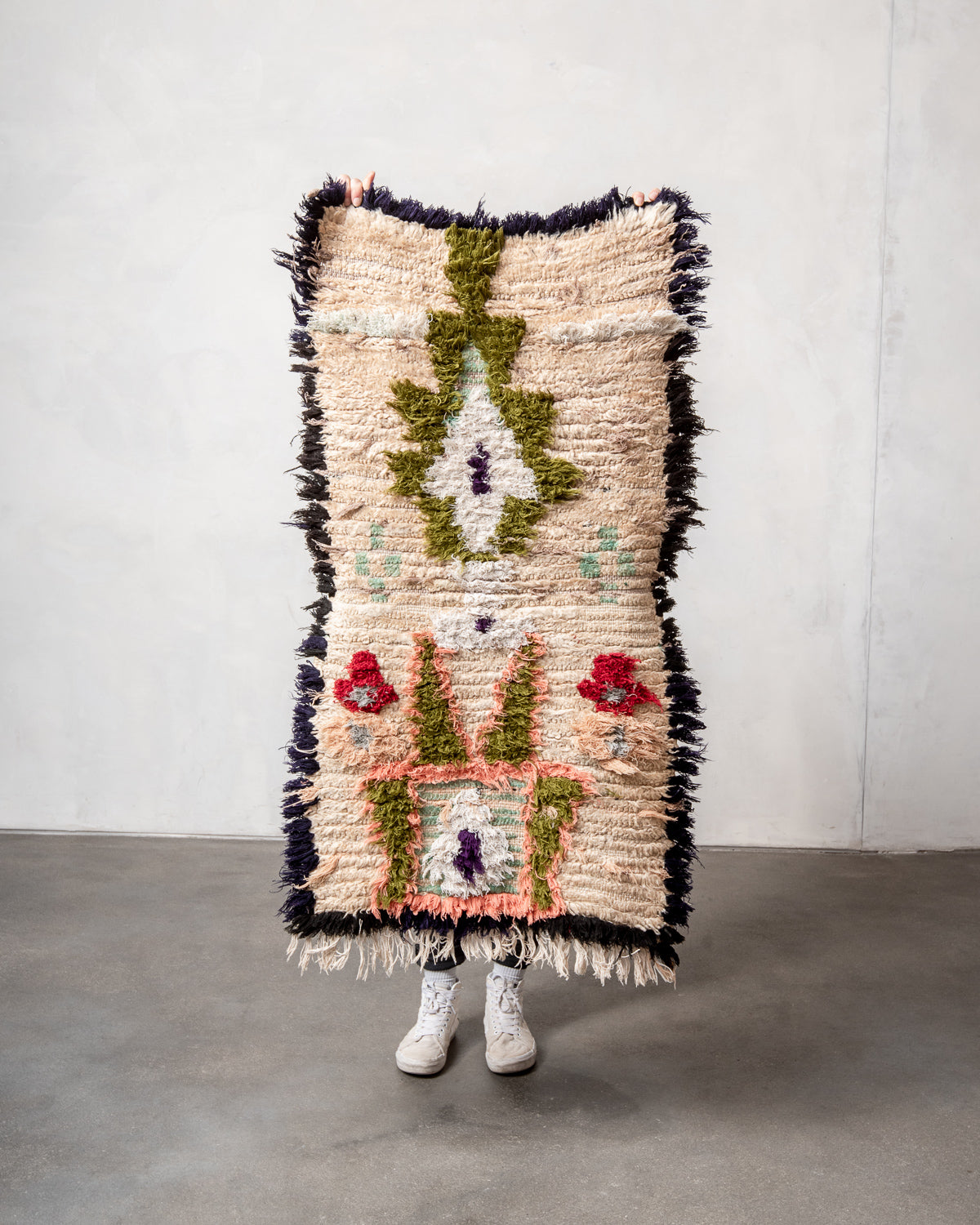 Modern designer vintage handcrafted Berber rug from Morocco. Boucherouite runner rug with beautiful colors and patterns.