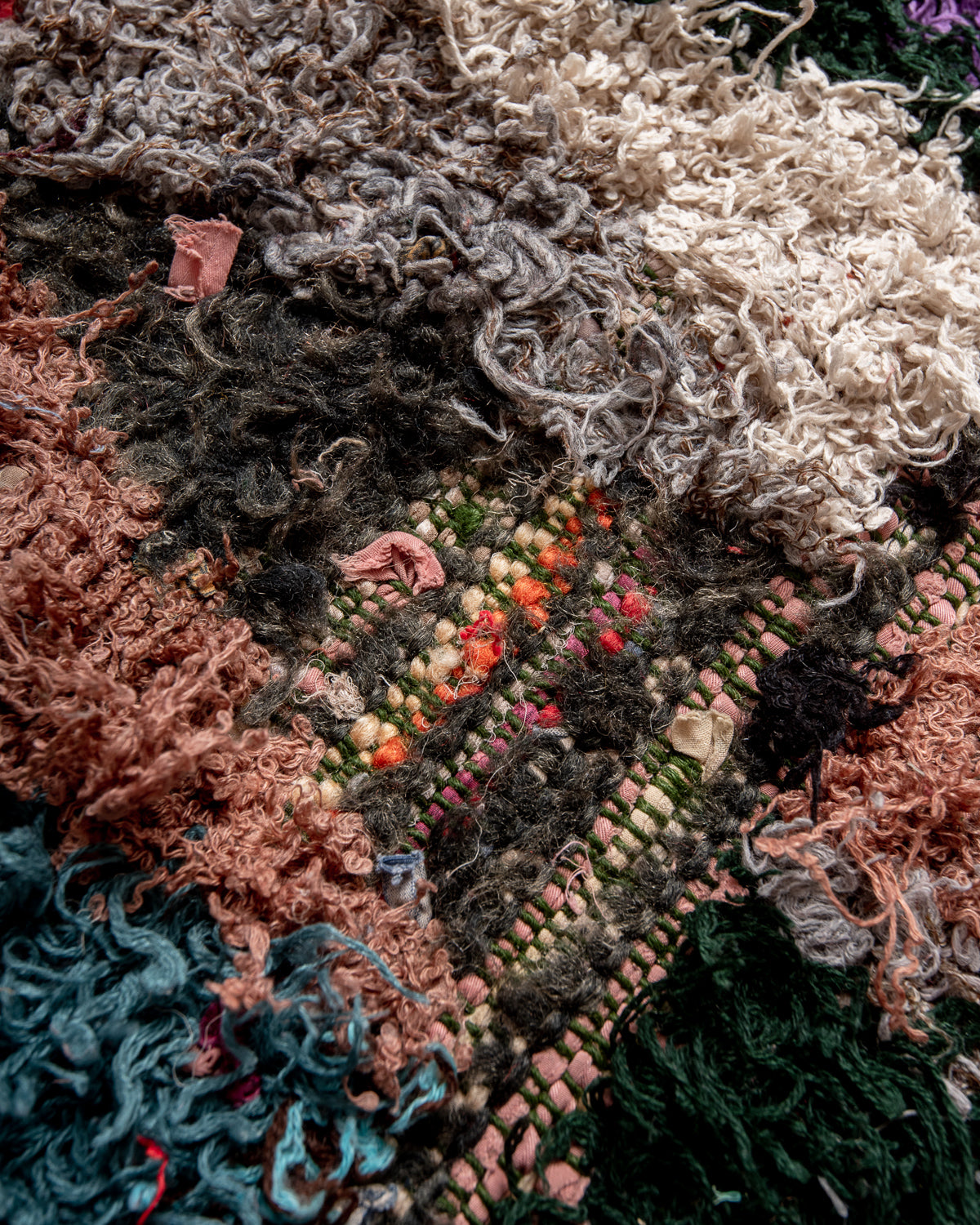 Modern designer vintage handcrafted Berber rug from Morocco. Boucherouite with beautiful colors and patterns.