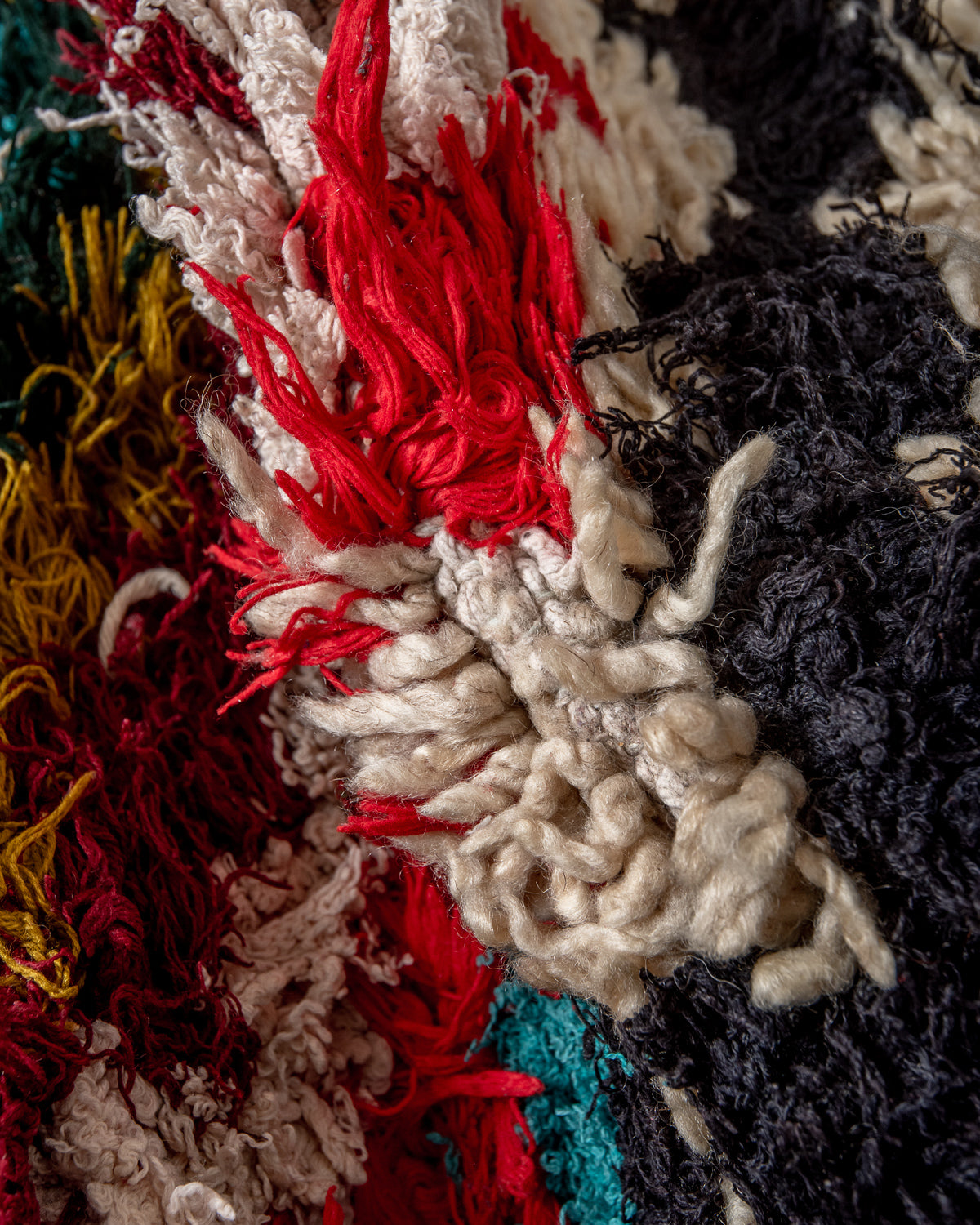 Modern designer vintage handcrafted Berber rug from Morocco. Boucherouite runner rug with beautiful colors and patterns.