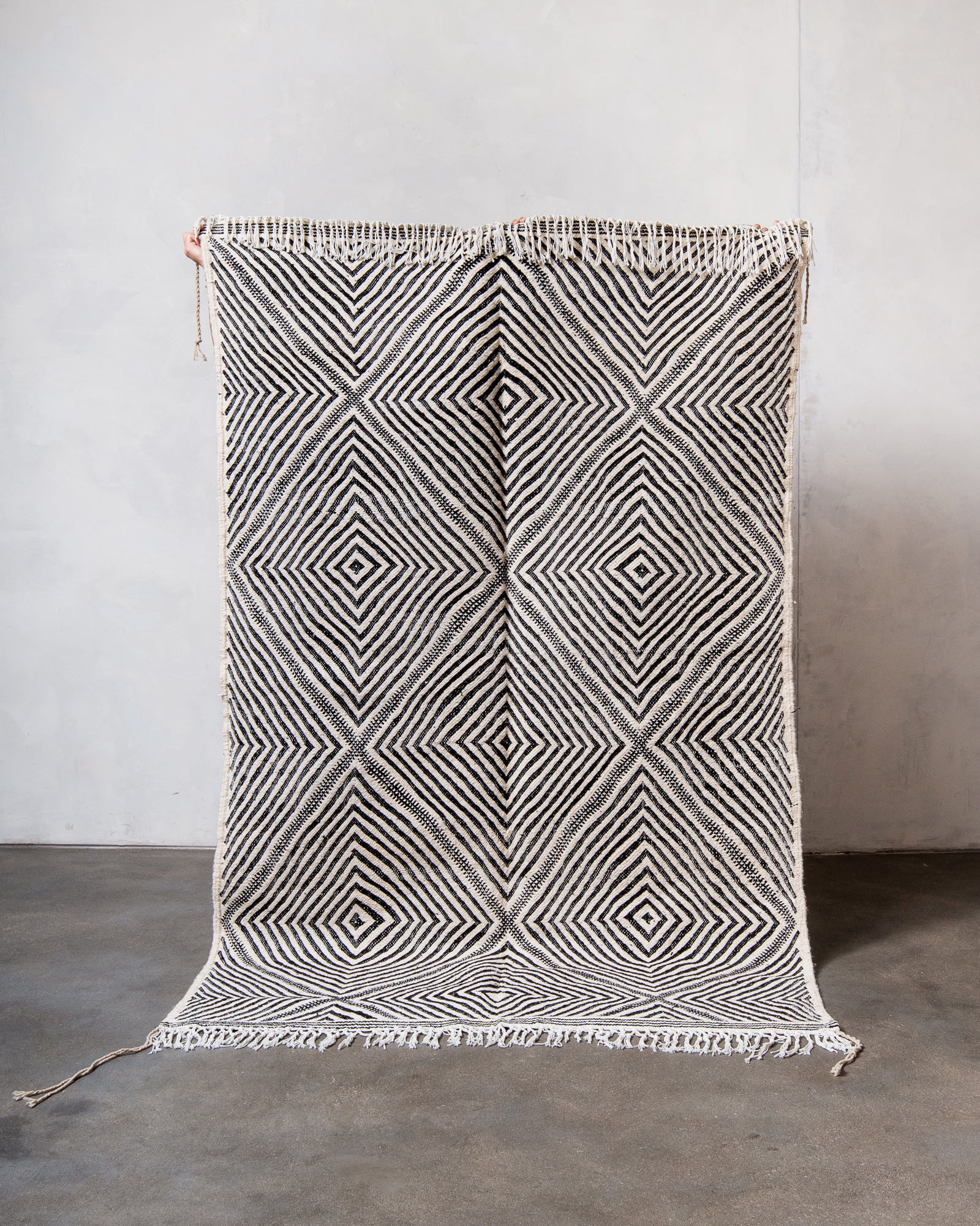Modern, handcrafted Berber rug from Morocco. Flat-woven Kelim carpet in black and white design. Made of 100% wool.