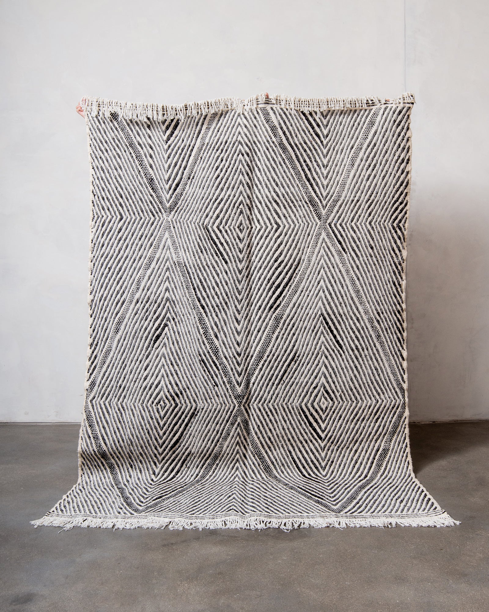 Modern, handcrafted Berber rug from Morocco. Flat-woven Kelim carpet in black and white design. Made of 100% wool.