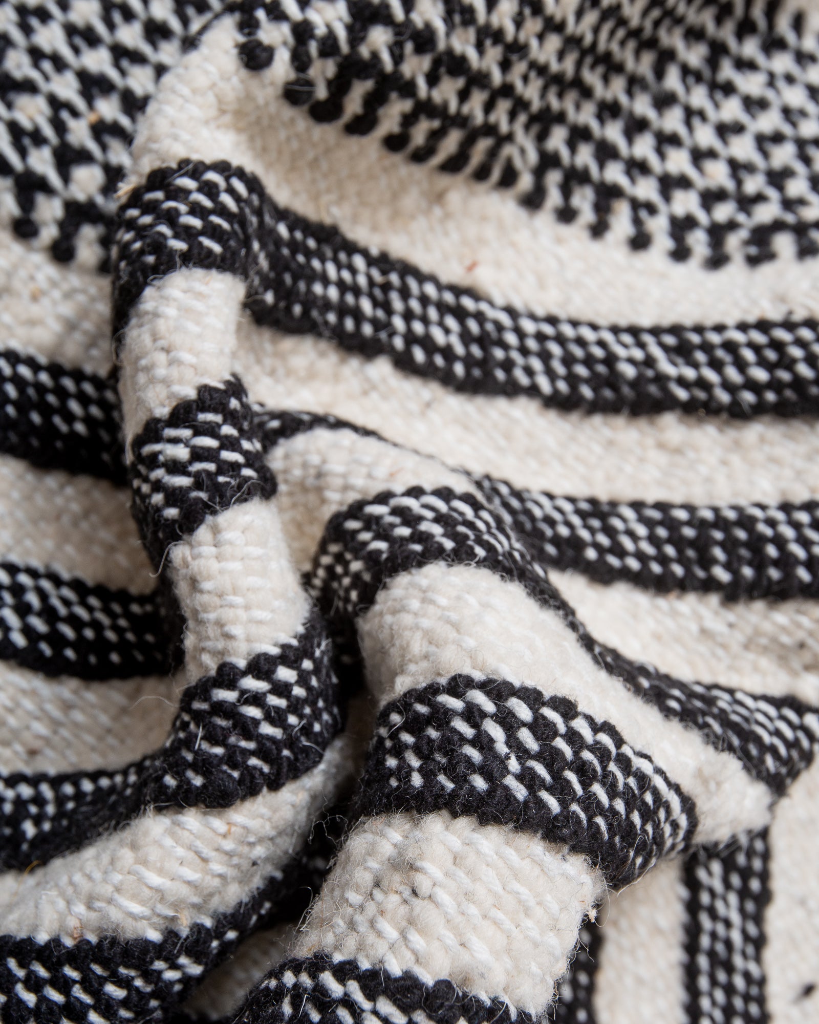 Modern, handcrafted Berber rug from Morocco. Flat-woven Kelim carpet in black and white design. Made of 100% wool.