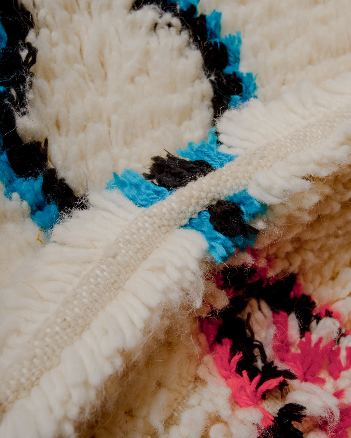 Close up of Azilal rug showing the extra row between the knots and density of the pile.