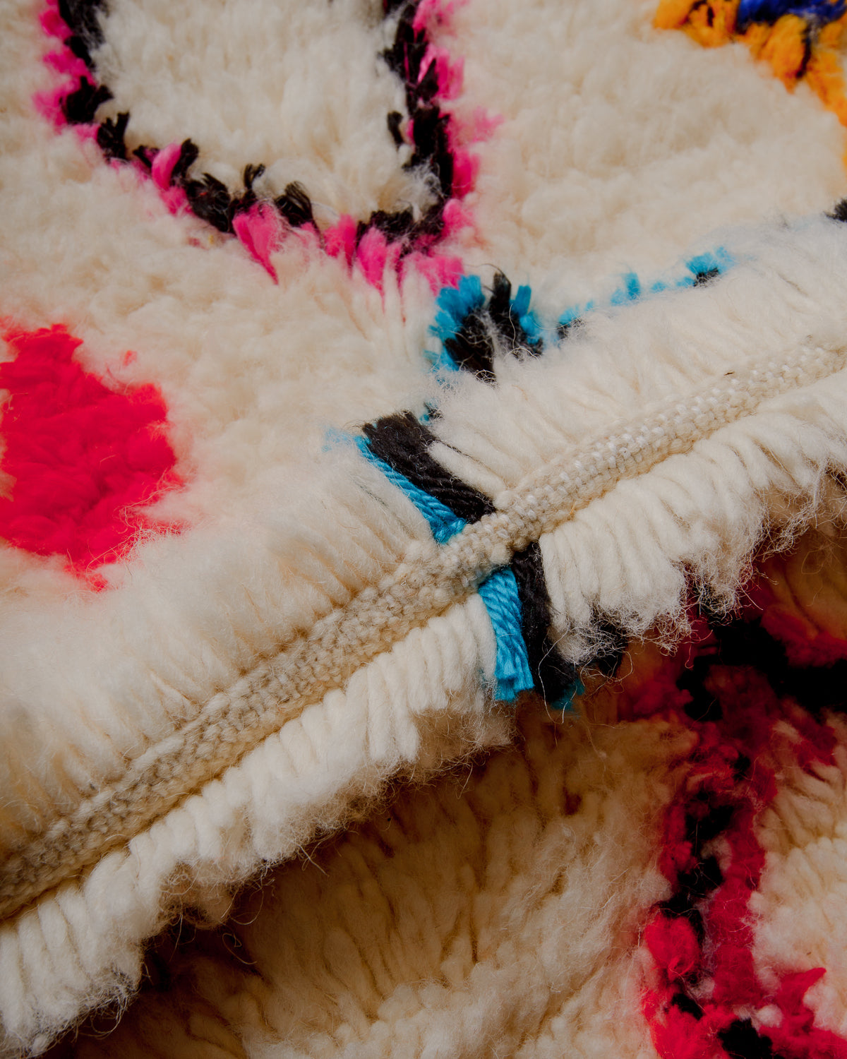 Close up of Azilal rug showing the extra row between the knots and density of wool pile.