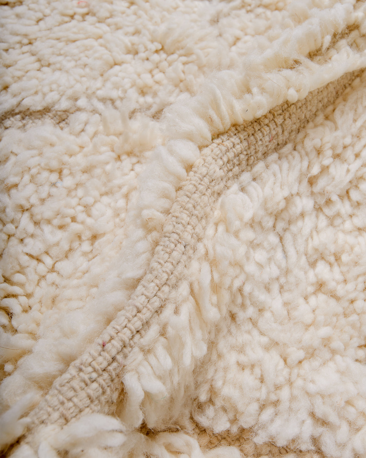 Detail of wool texture of Berberlin beniourain rug. 